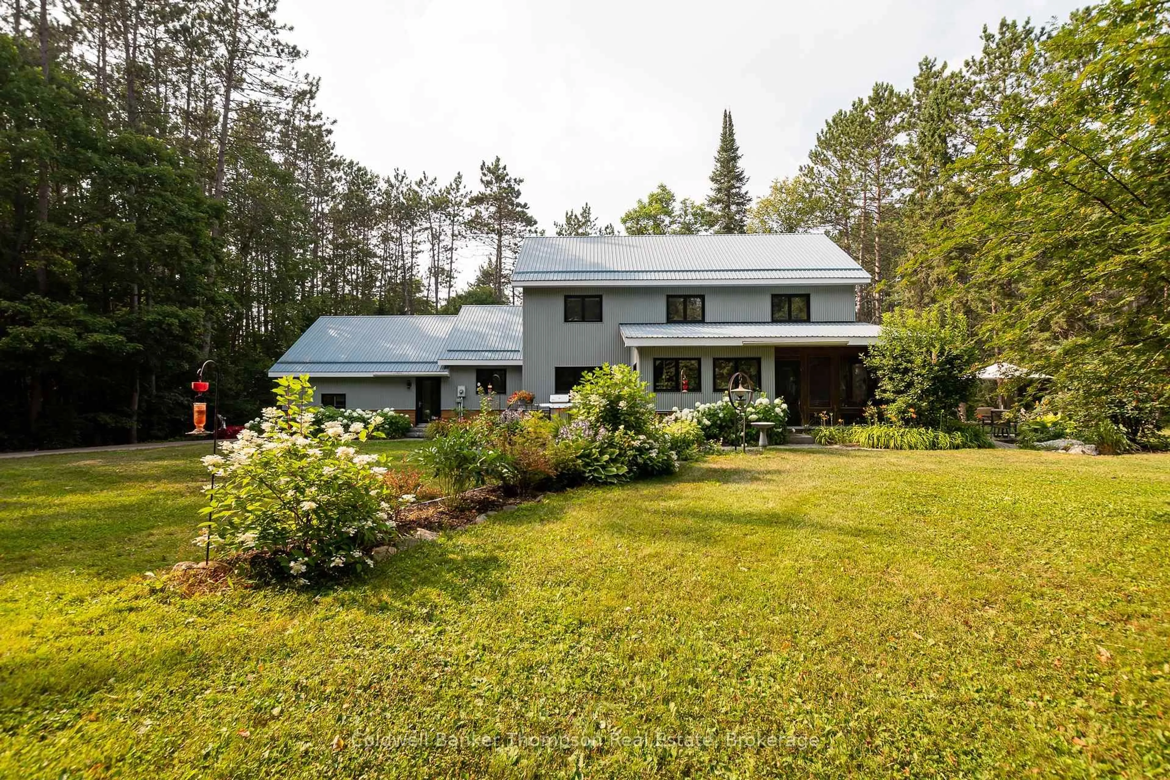 A pic from outside/outdoor area/front of a property/back of a property/a pic from drone, unknown for 1095 Williamsport Rd, Huntsville Ontario P1H 2J4