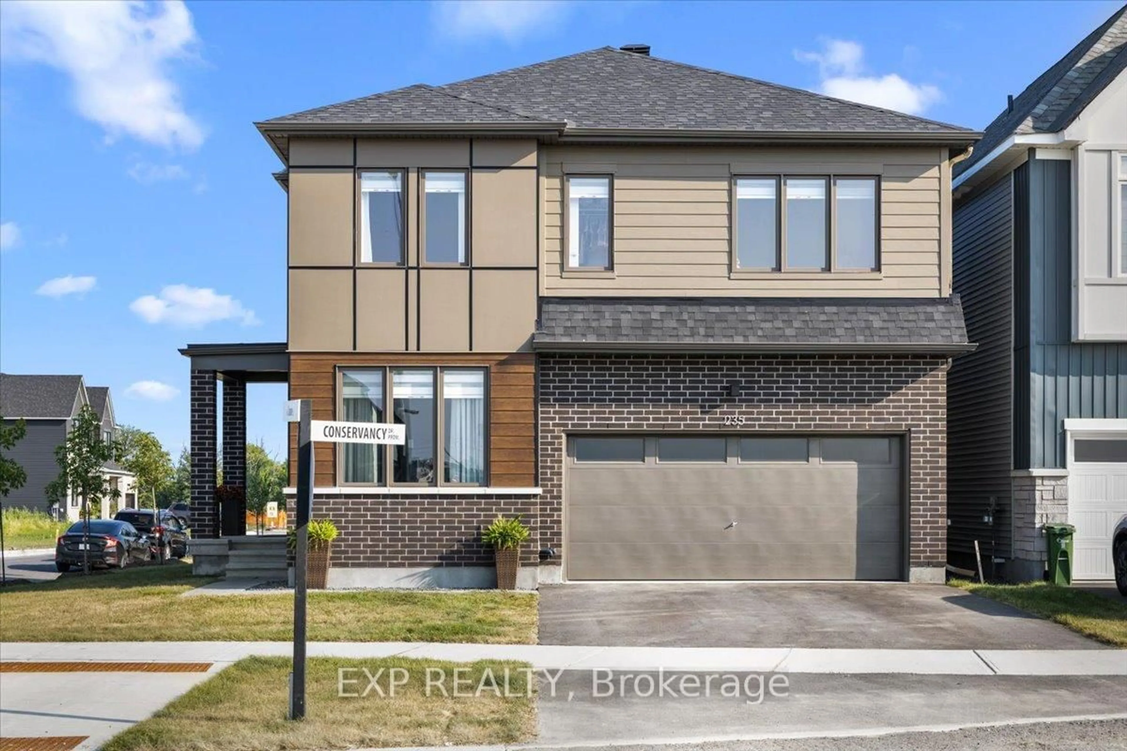 Home with brick exterior material, street for 235 Conservancy Dr, Ottawa Ontario K2J 7M5