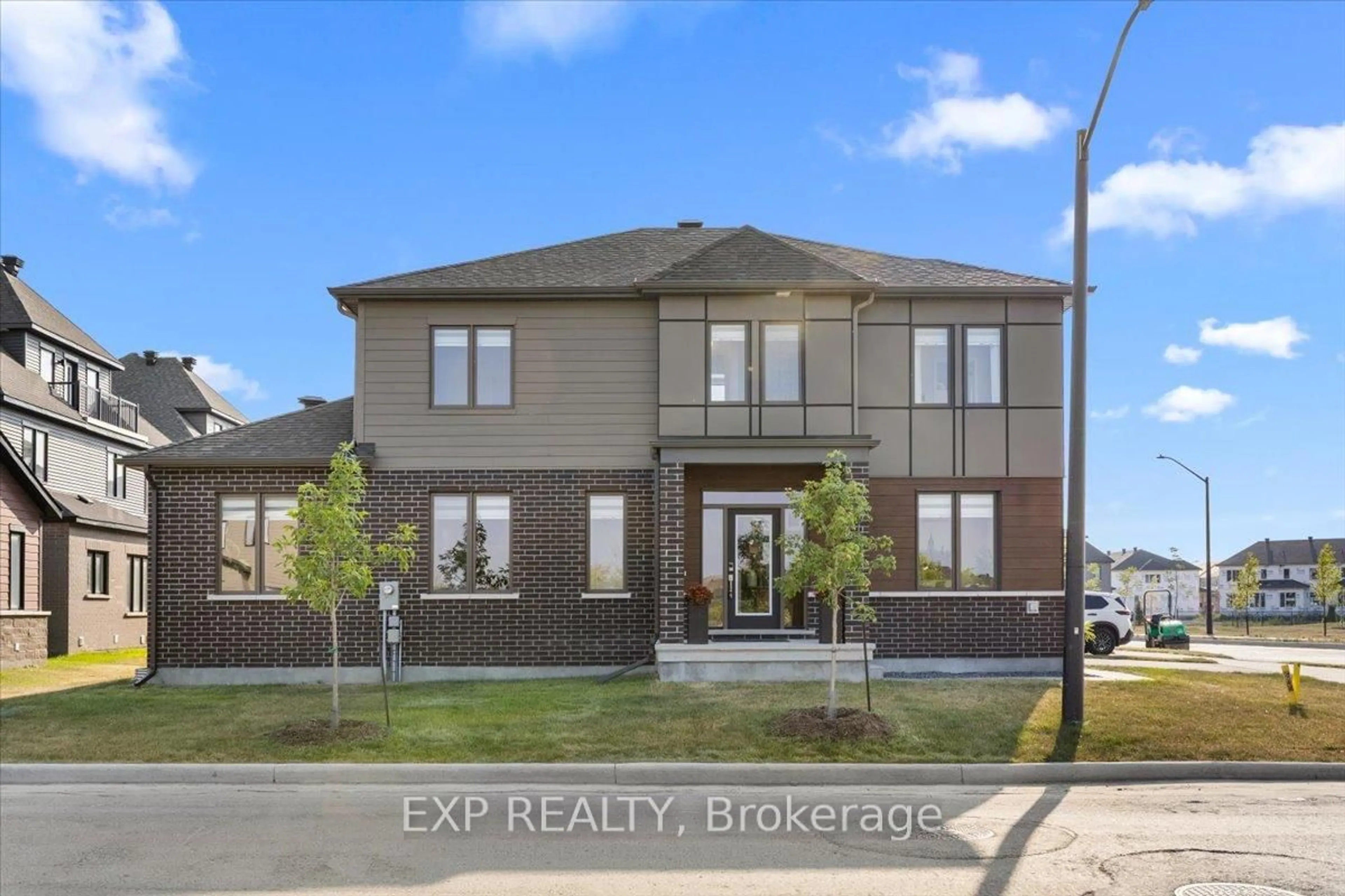 Home with brick exterior material, street for 235 Conservancy Dr, Ottawa Ontario K2J 7M5
