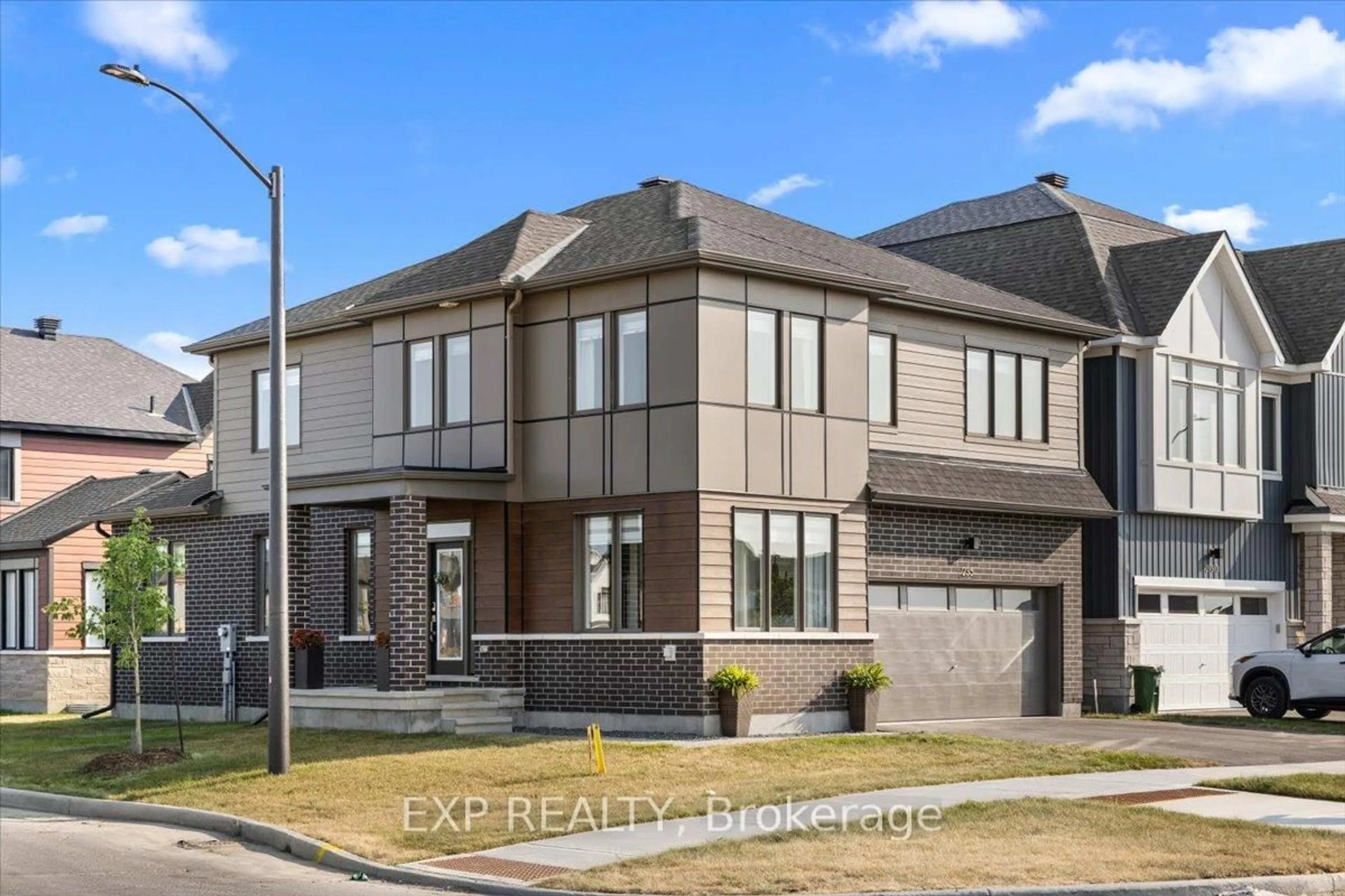Home with brick exterior material, street for 235 Conservancy Dr, Ottawa Ontario K2J 7M5