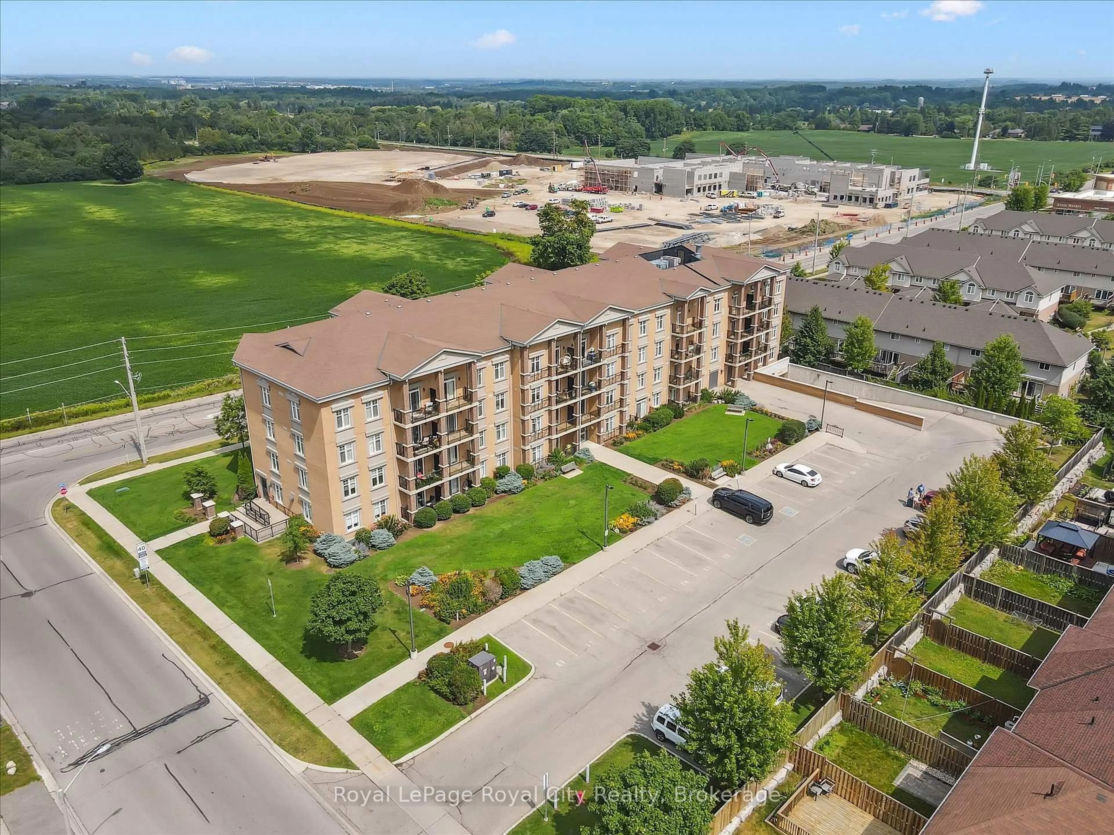 A pic from outside/outdoor area/front of a property/back of a property/a pic from drone, unknown for 2 Colonial Dr #403, Guelph Ontario N1L 0K8