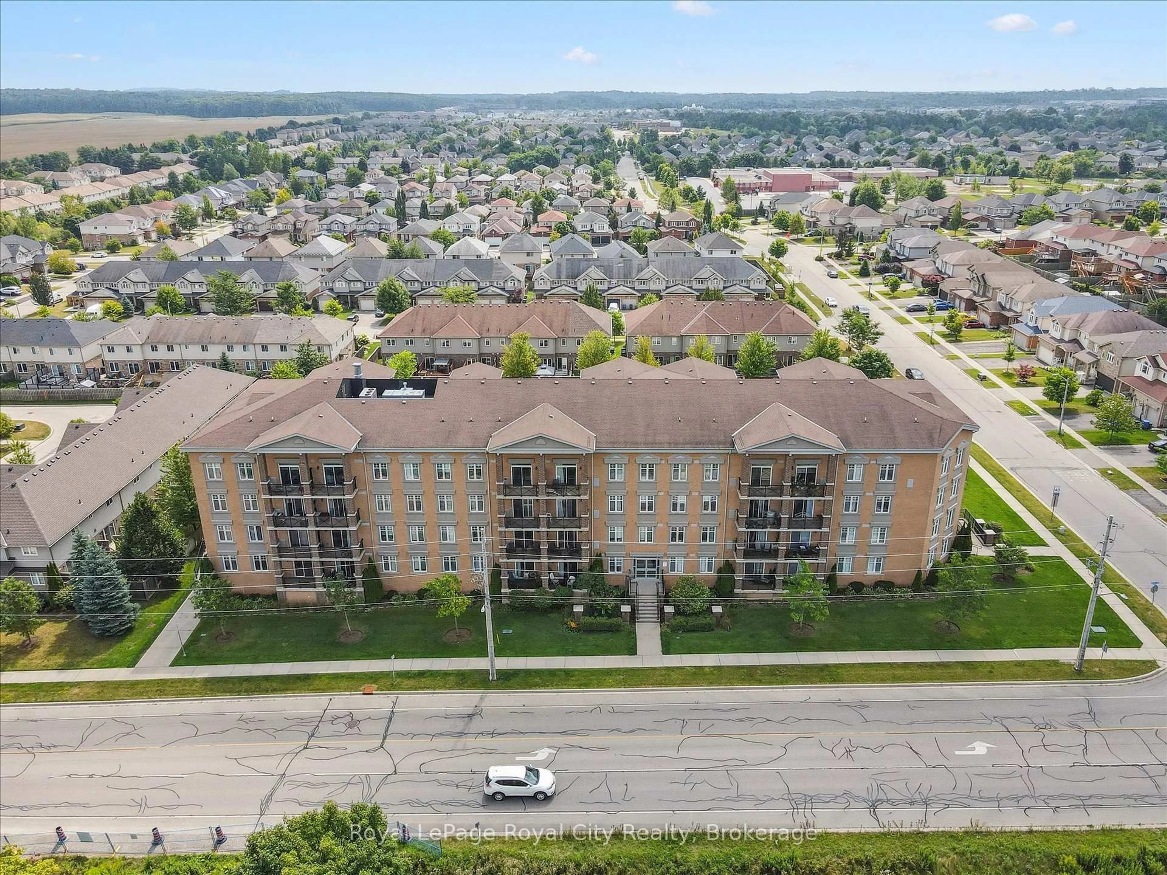 A pic from outside/outdoor area/front of a property/back of a property/a pic from drone, unknown for 2 Colonial Dr #403, Guelph Ontario N1L 0K8