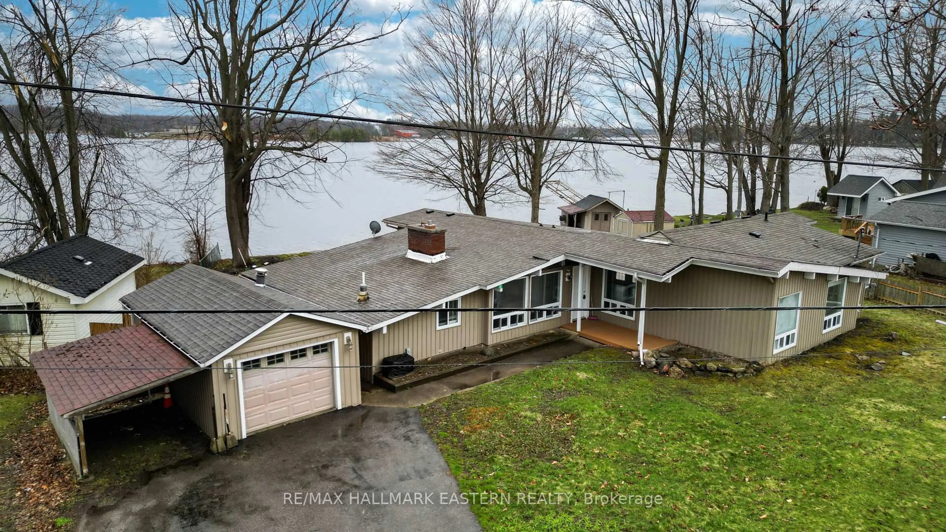 A pic from outside/outdoor area/front of a property/back of a property/a pic from drone, water/lake/river/ocean view for 30 Edgewater Dr, Selwyn Ontario K0L 1T0