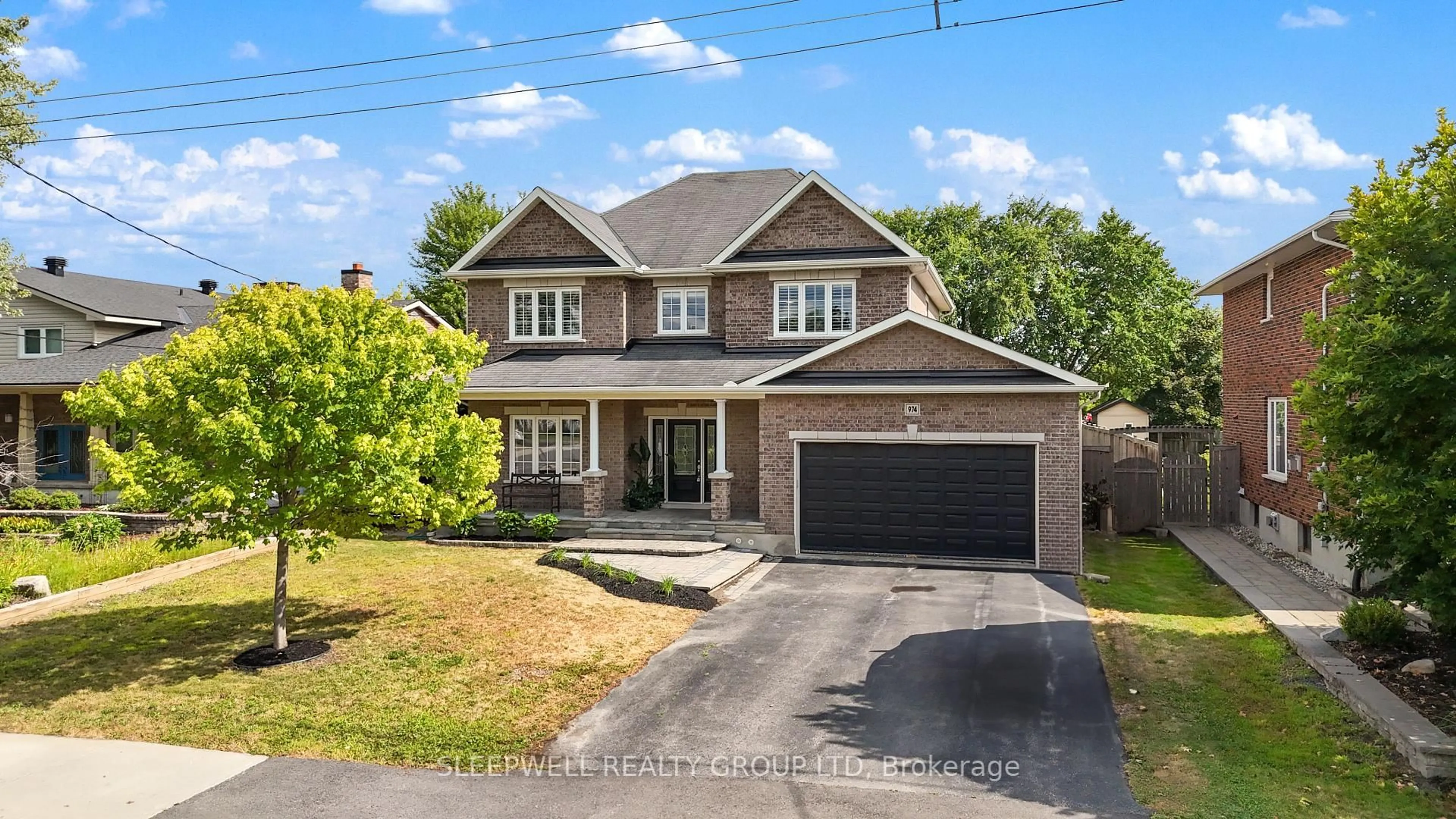 Home with brick exterior material, street for 974 Falaise Rd, Ottawa Ontario K2C 0M1