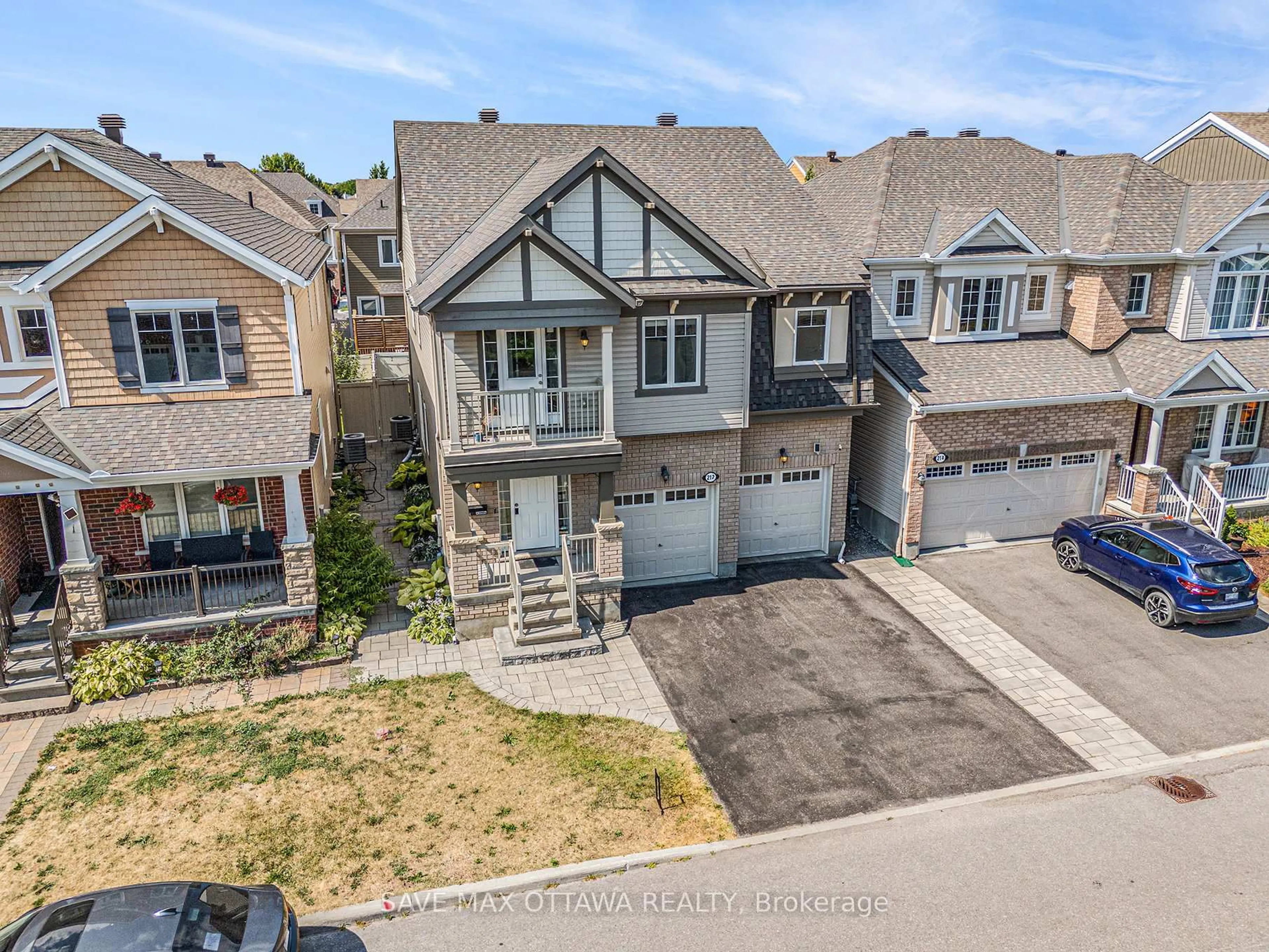 A pic from outside/outdoor area/front of a property/back of a property/a pic from drone, street for 212 Rivertree St, Ottawa Ontario K2M 0J3