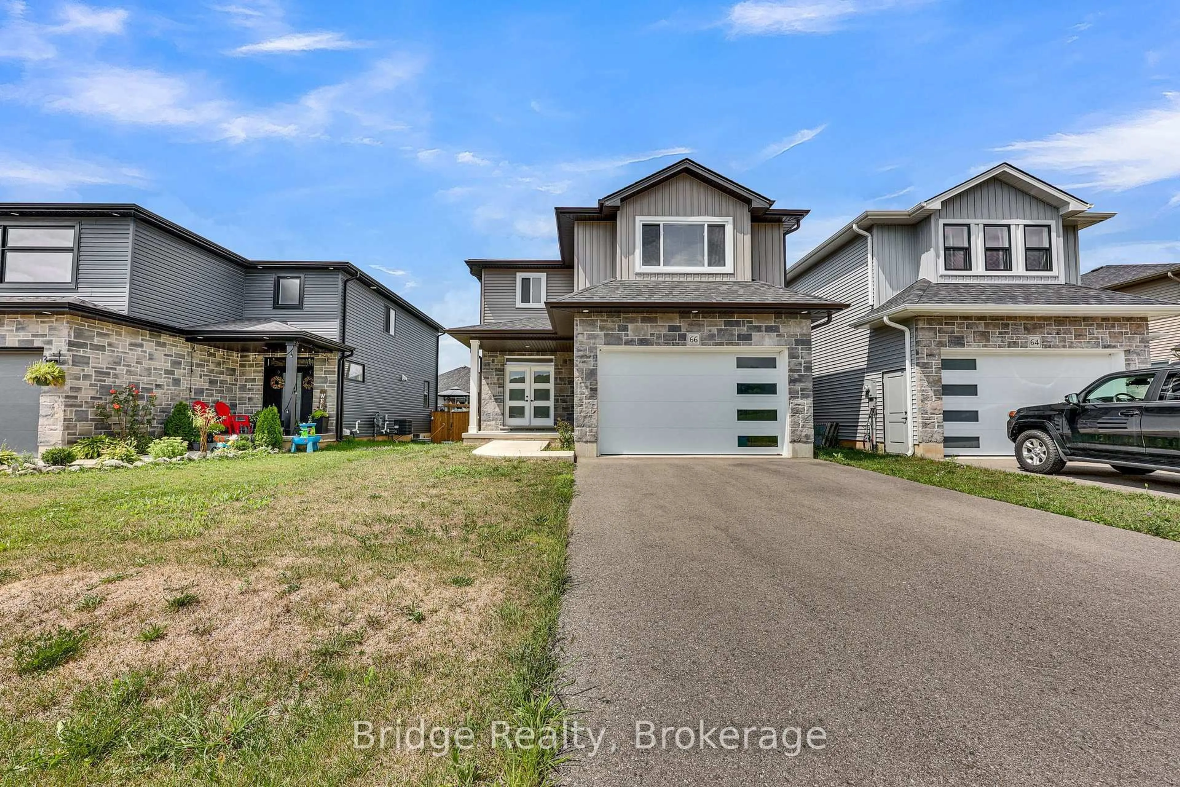 A pic from outside/outdoor area/front of a property/back of a property/a pic from drone, street for 66 Cash Cres, Ingersoll Ontario N5C 0E2