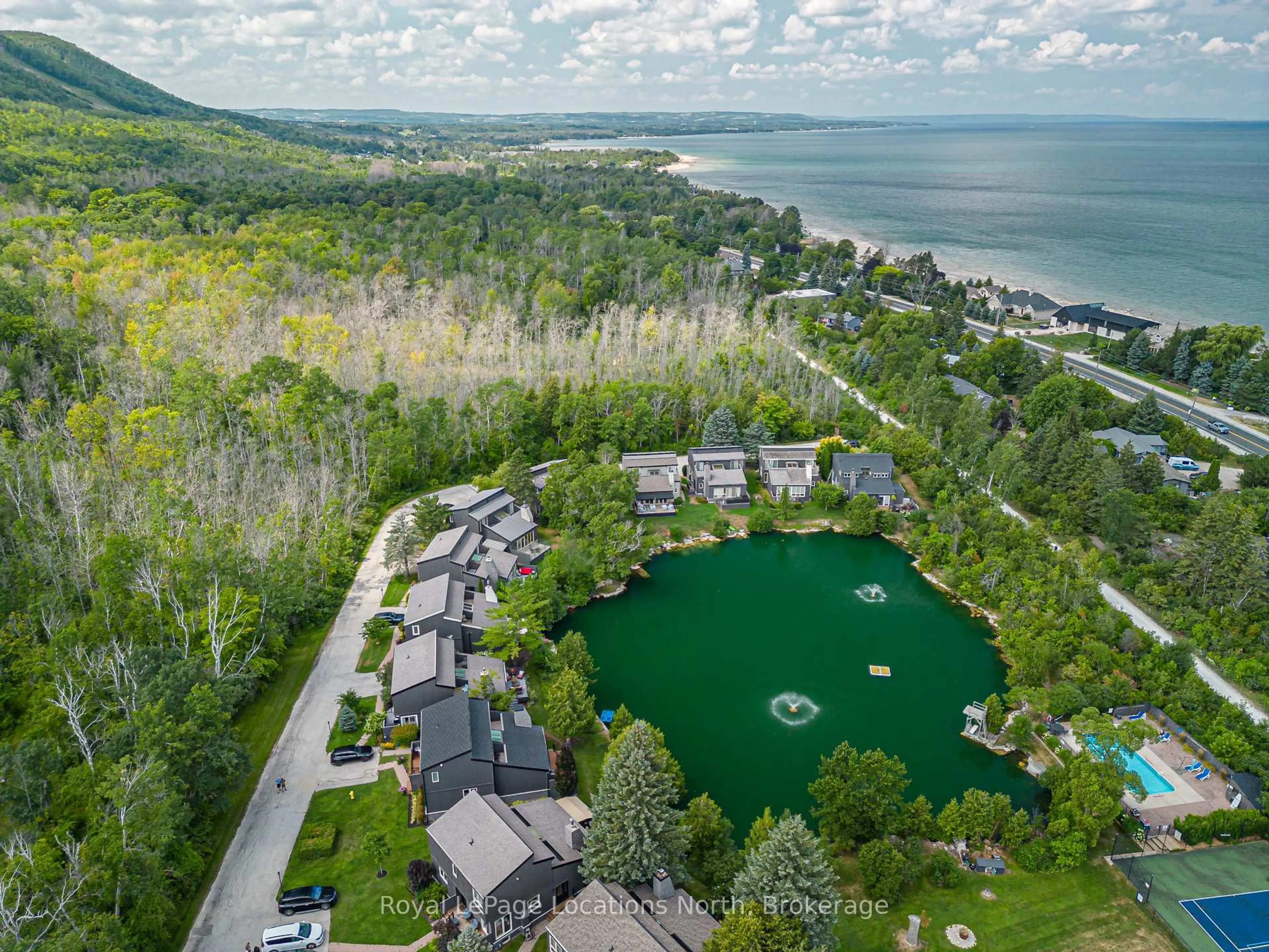 A pic from outside/outdoor area/front of a property/back of a property/a pic from drone, water/lake/river/ocean view for 116 Hidden Lake Rd #10, Blue Mountains Ontario L9Y 0T6