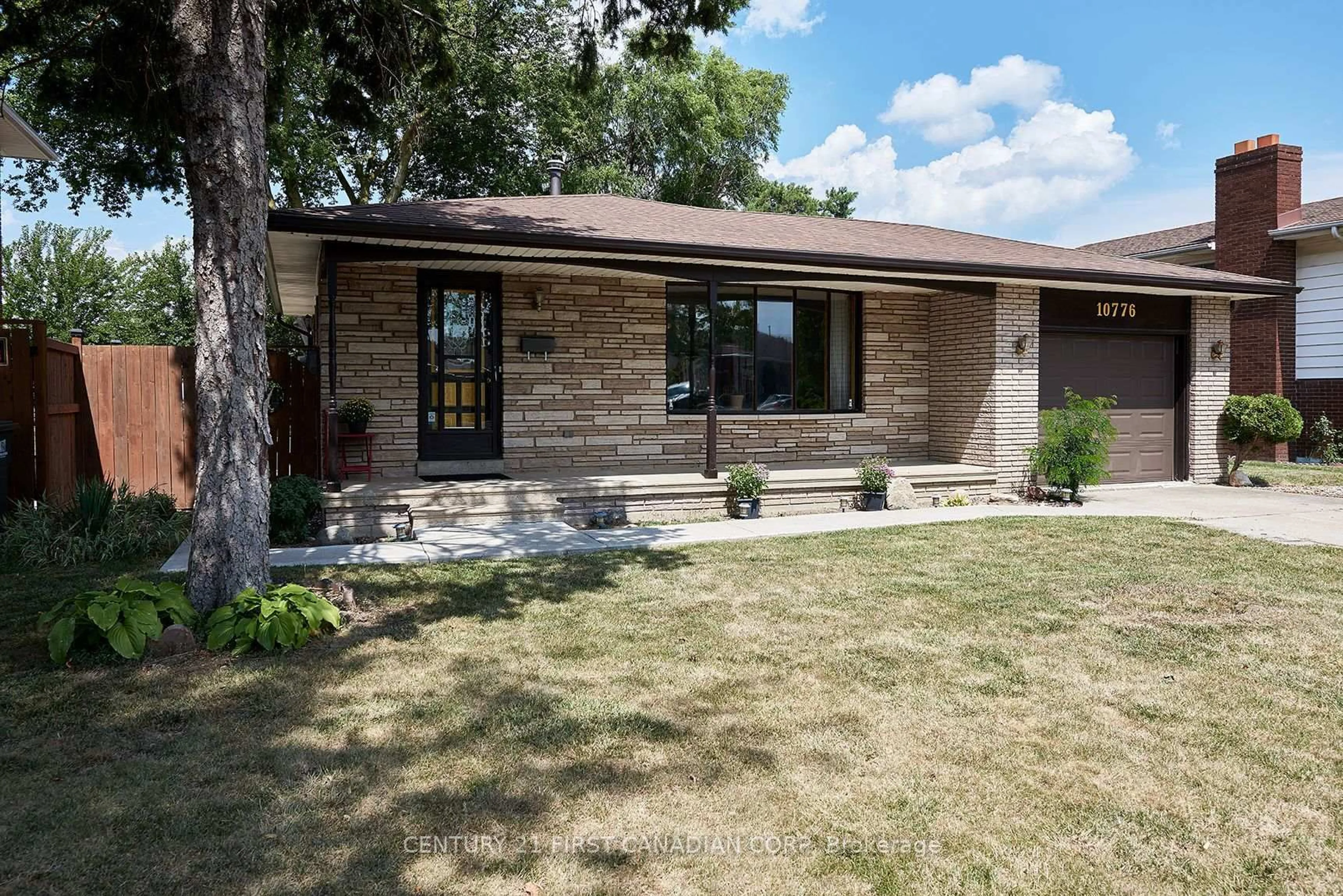 Home with brick exterior material, street for 10776 Atwater Cres, Windsor Ontario N8R 1N6