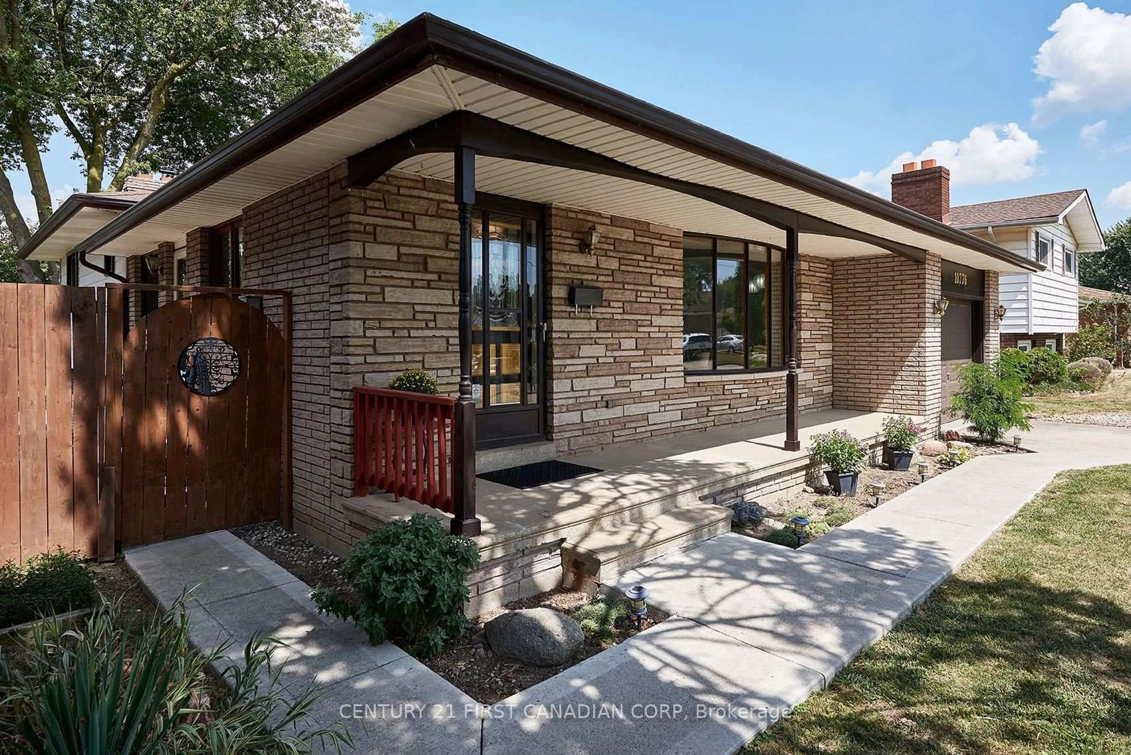Home with brick exterior material, street for 10776 Atwater Cres, Windsor Ontario N8R 1N6