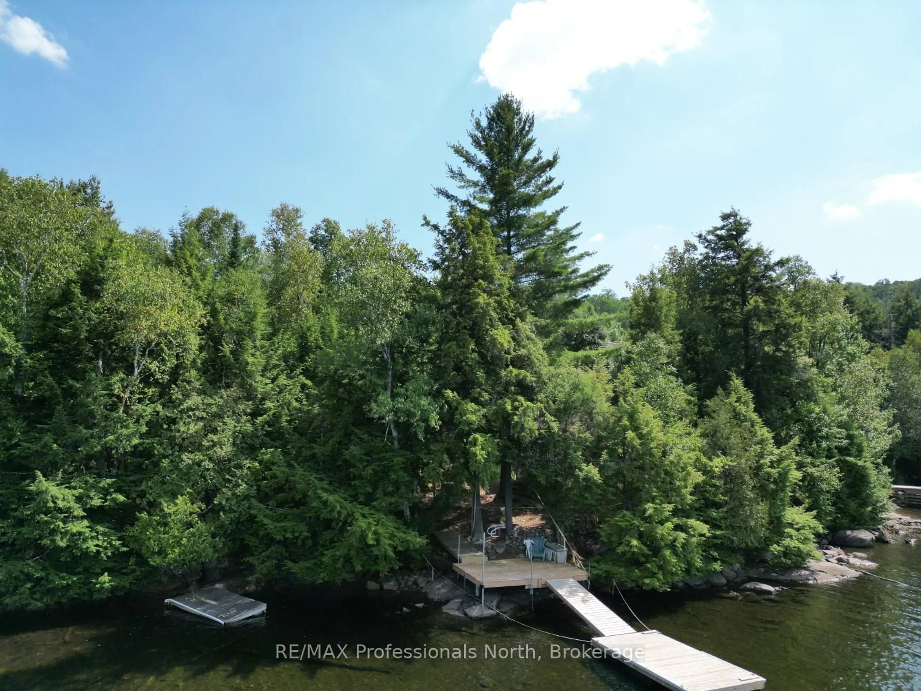 A pic from outside/outdoor area/front of a property/back of a property/a pic from drone, water/lake/river/ocean view for 2169 Fred Jones Rd, Dysart et al Ontario K0M 1S0