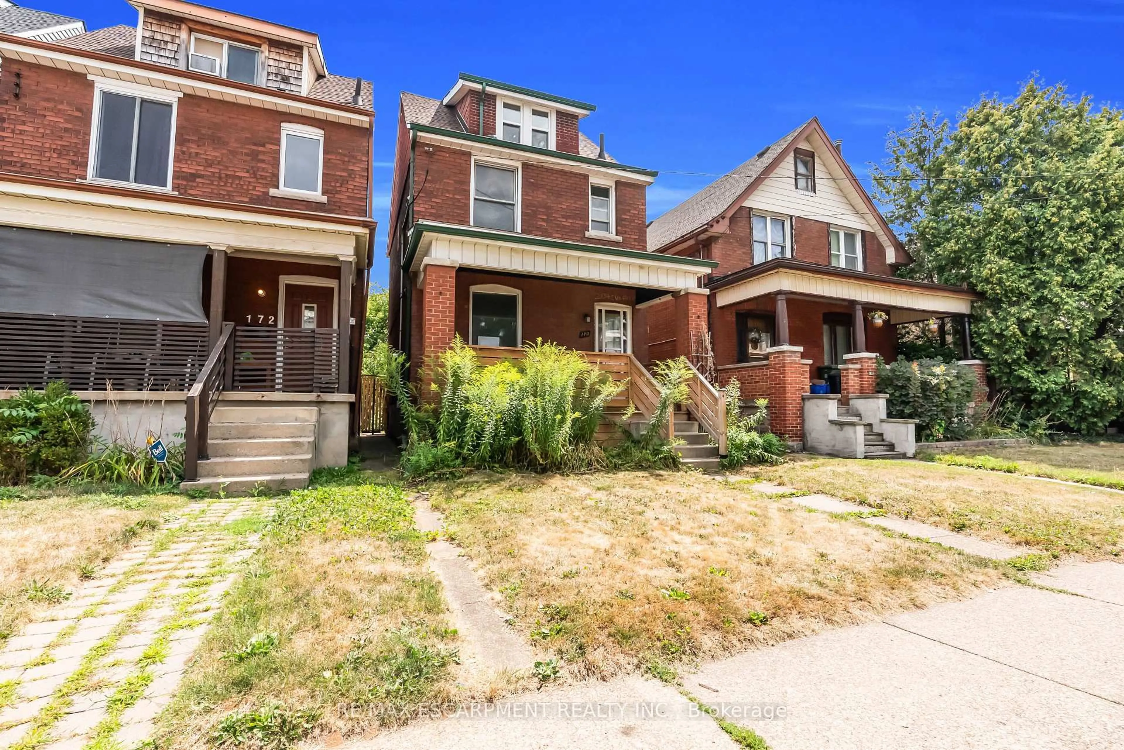Home with brick exterior material, street for 170 Grosvenor Ave, Hamilton Ontario L8L 7S8