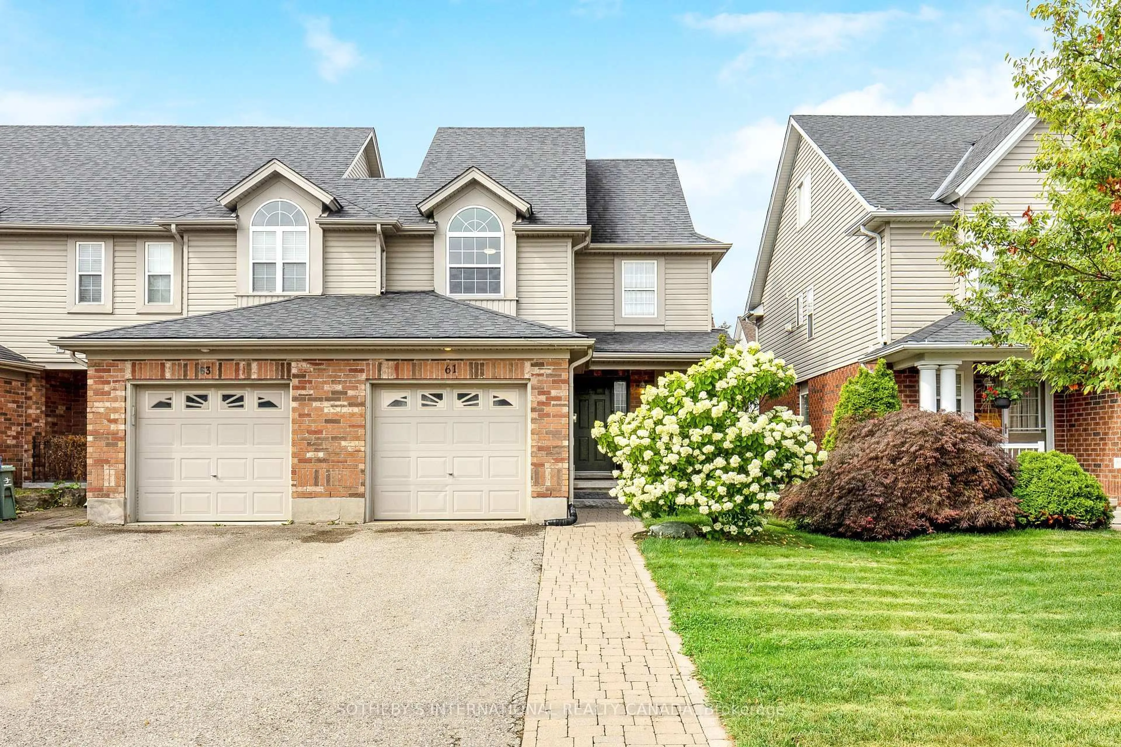 Home with brick exterior material, street for 61 Darling Cres, Guelph Ontario N1L 1P9