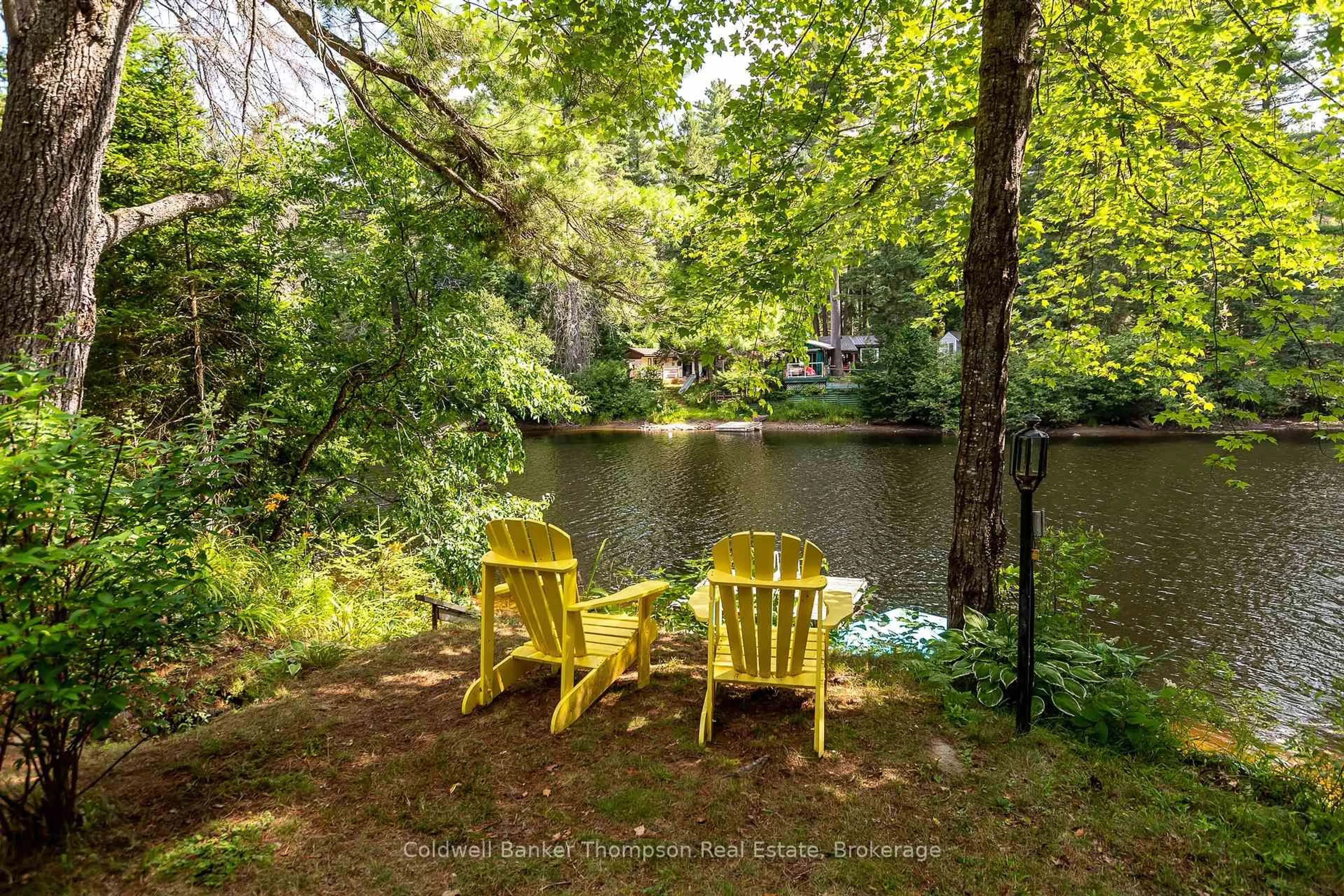 Patio, water/lake/river/ocean view for 132 Muskoka River Rd, Huntsville Ontario P0B 1L0