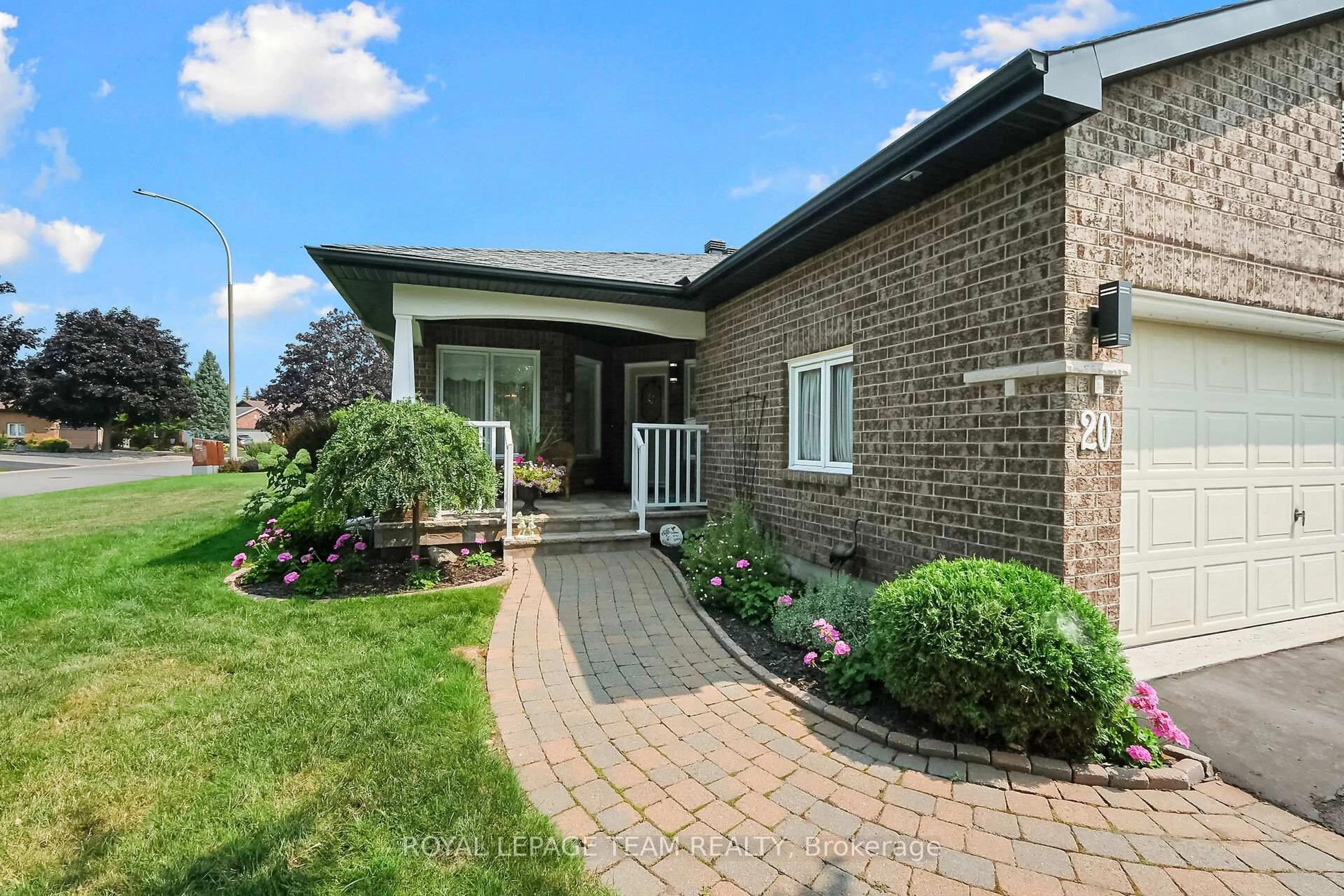 Home with brick exterior material, street for 20 Peregrine Cres, Kanata Ontario K2M 2T3
