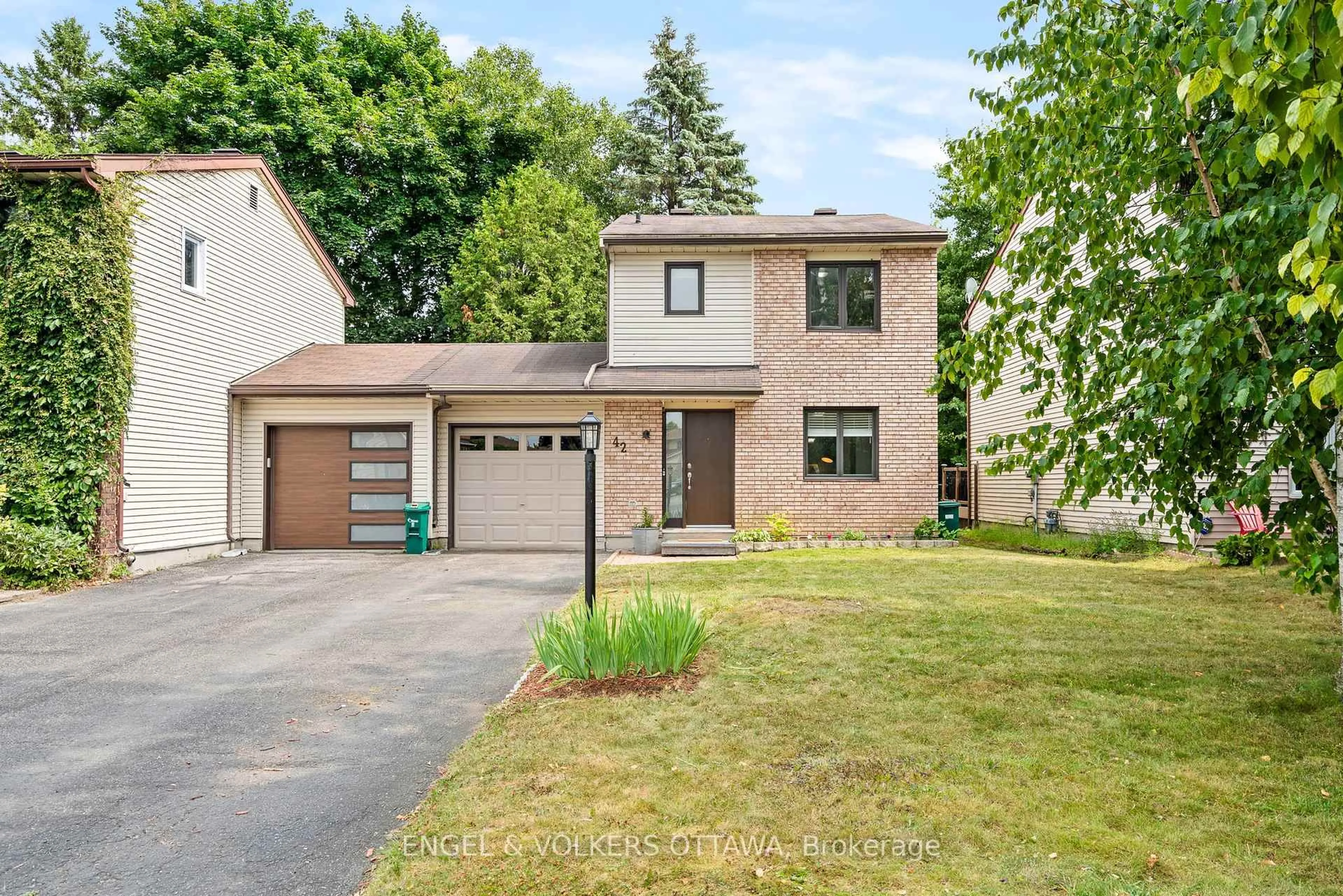 Home with brick exterior material, street for 42 Henfield Ave, Ottawa Ontario K2J 1J8