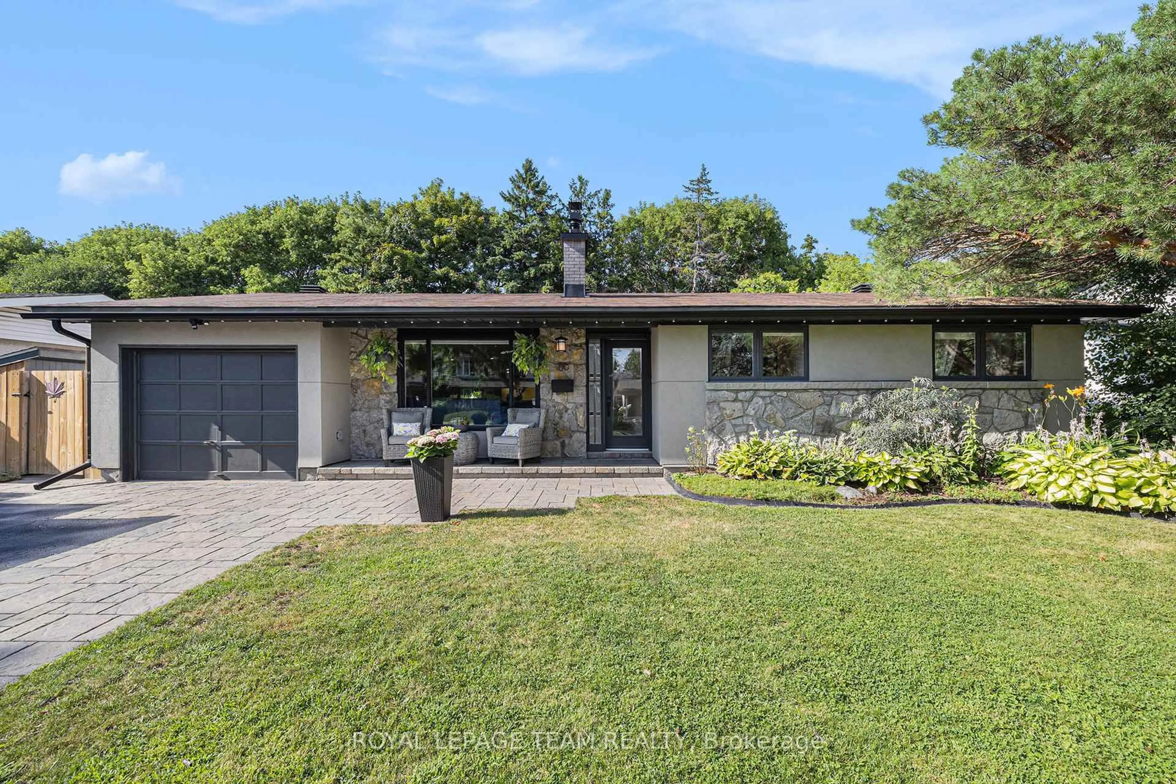 Home with brick exterior material, street for 100 Queensline Dr, Ottawa Ontario K2H 7J5