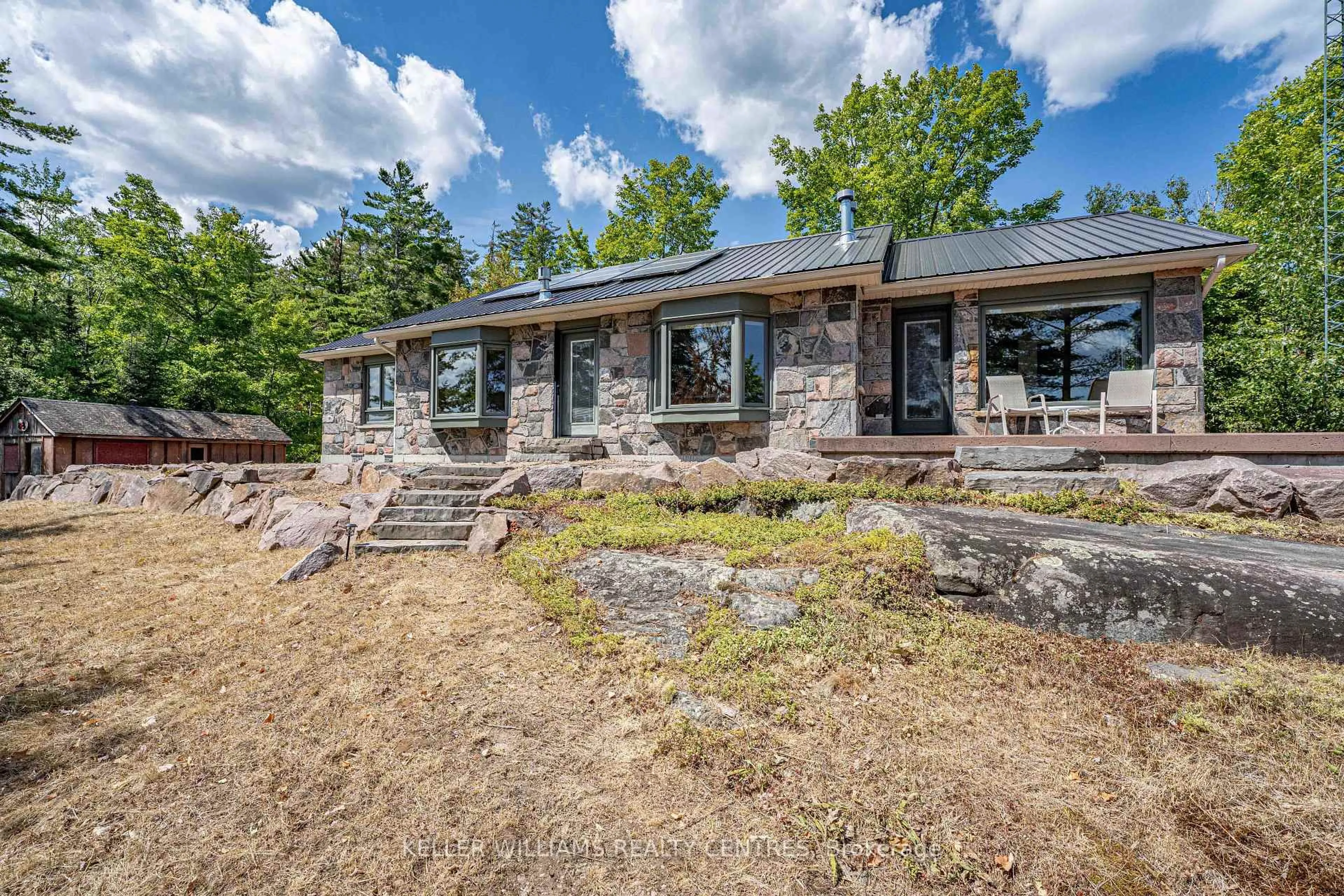 Home with brick exterior material, unknown for 98 Fire Access Rd, Trent Lakes Ontario K0L 1J0