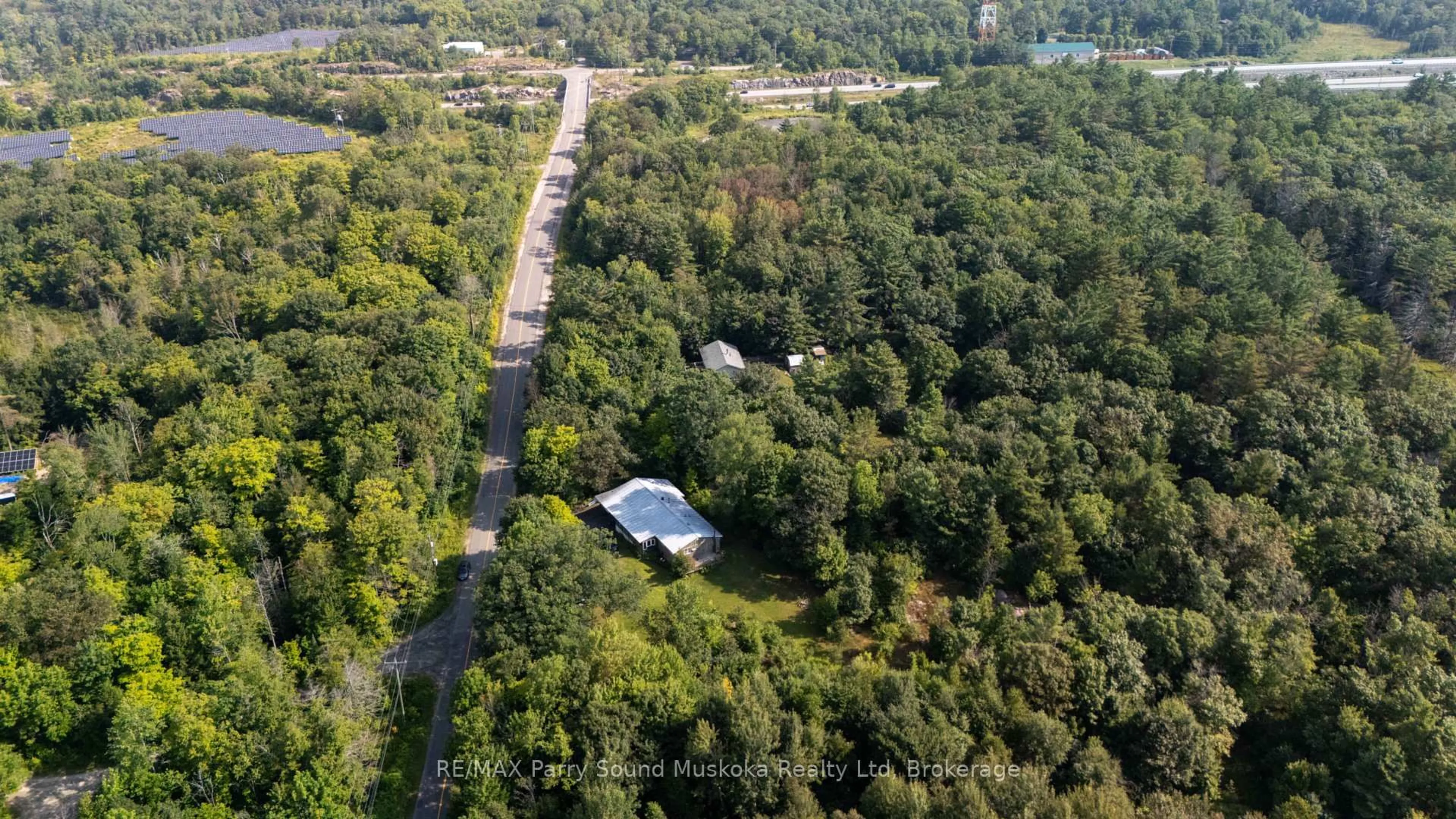 A pic from outside/outdoor area/front of a property/back of a property/a pic from drone, forest/trees view for 28 Black Rd, Seguin Ontario P2A 2W8