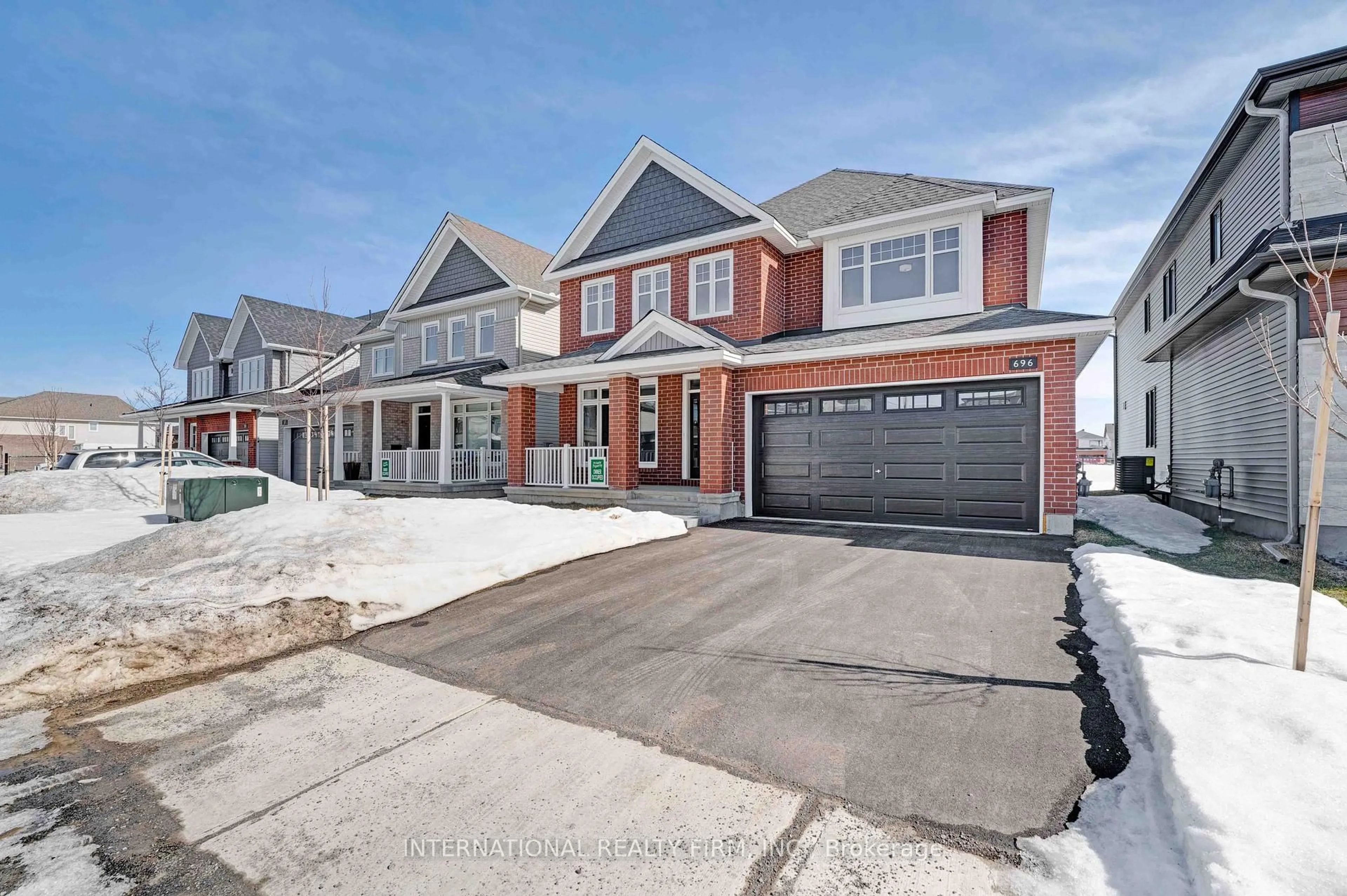 Home with brick exterior material, street for 696 Moonflower Cres, Ottawa Ontario K1T 0X8