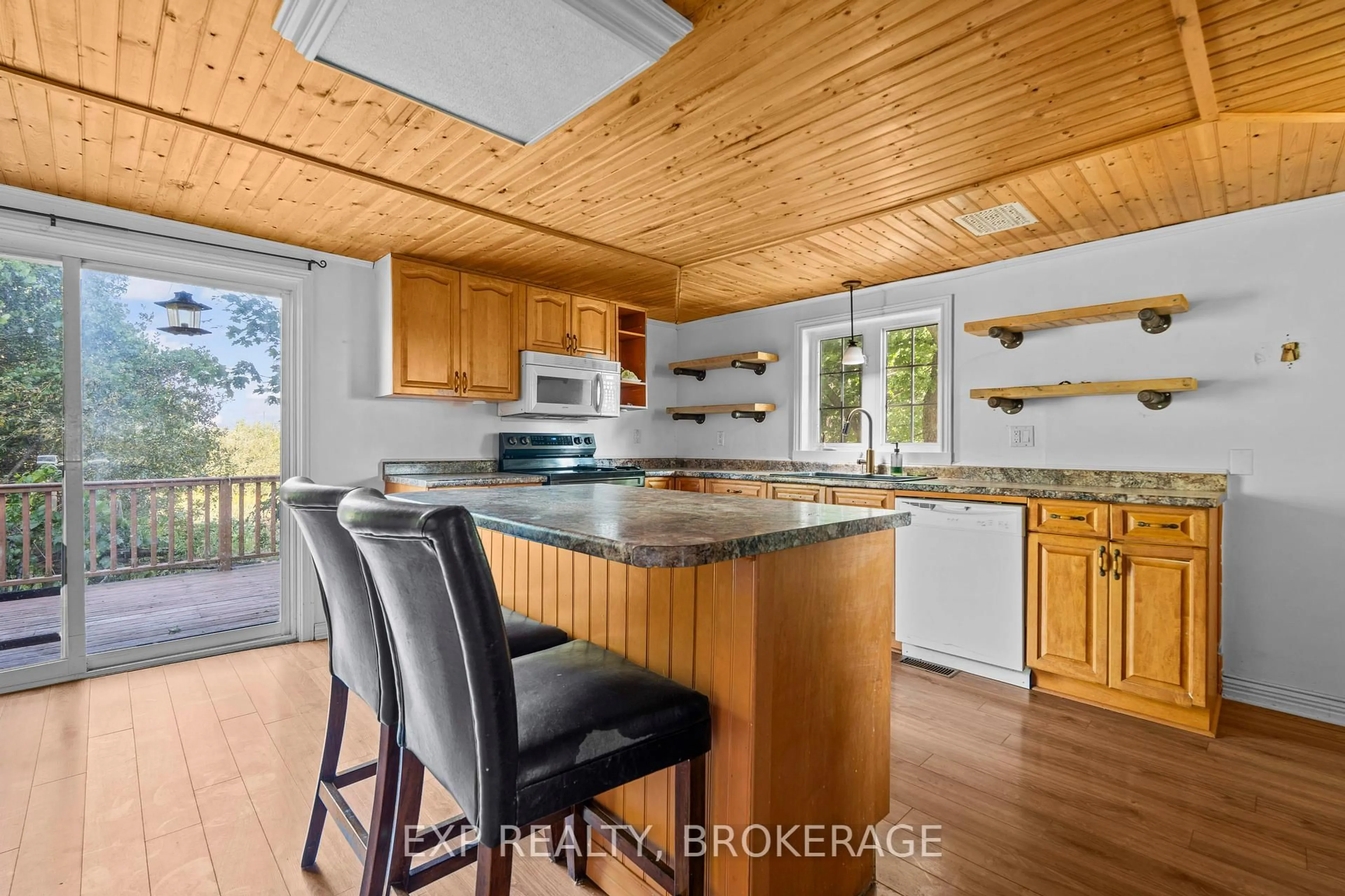Open concept kitchen, wood/laminate floor for 129 DULCEMAINE Rd, Front of Leeds & Seeleys Bay Ontario K0E 1L0