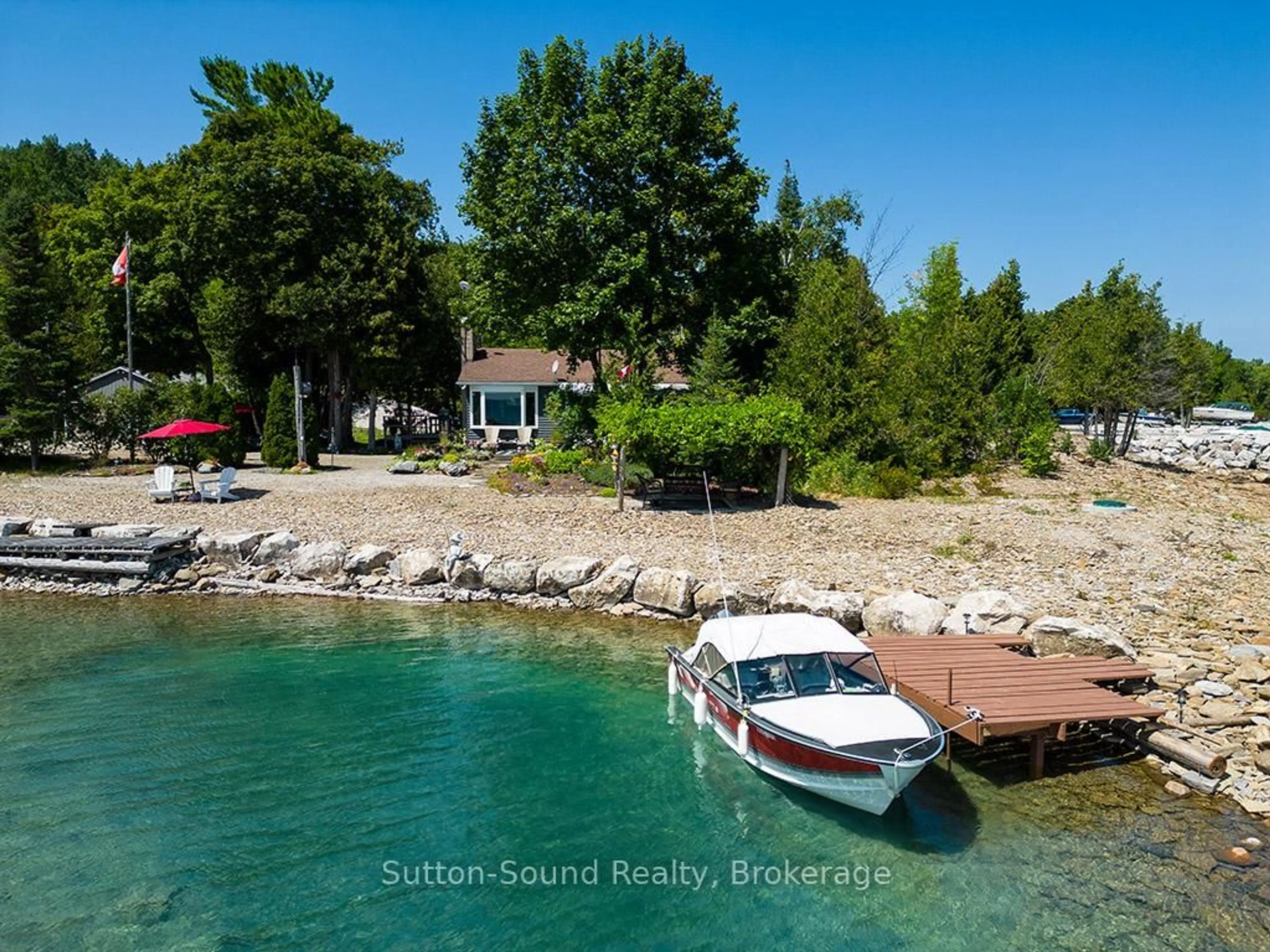 A pic from outside/outdoor area/front of a property/back of a property/a pic from drone, water/lake/river/ocean view for 505113 GREY ROAD 1, Georgian Bluffs Ontario N0H 2T0