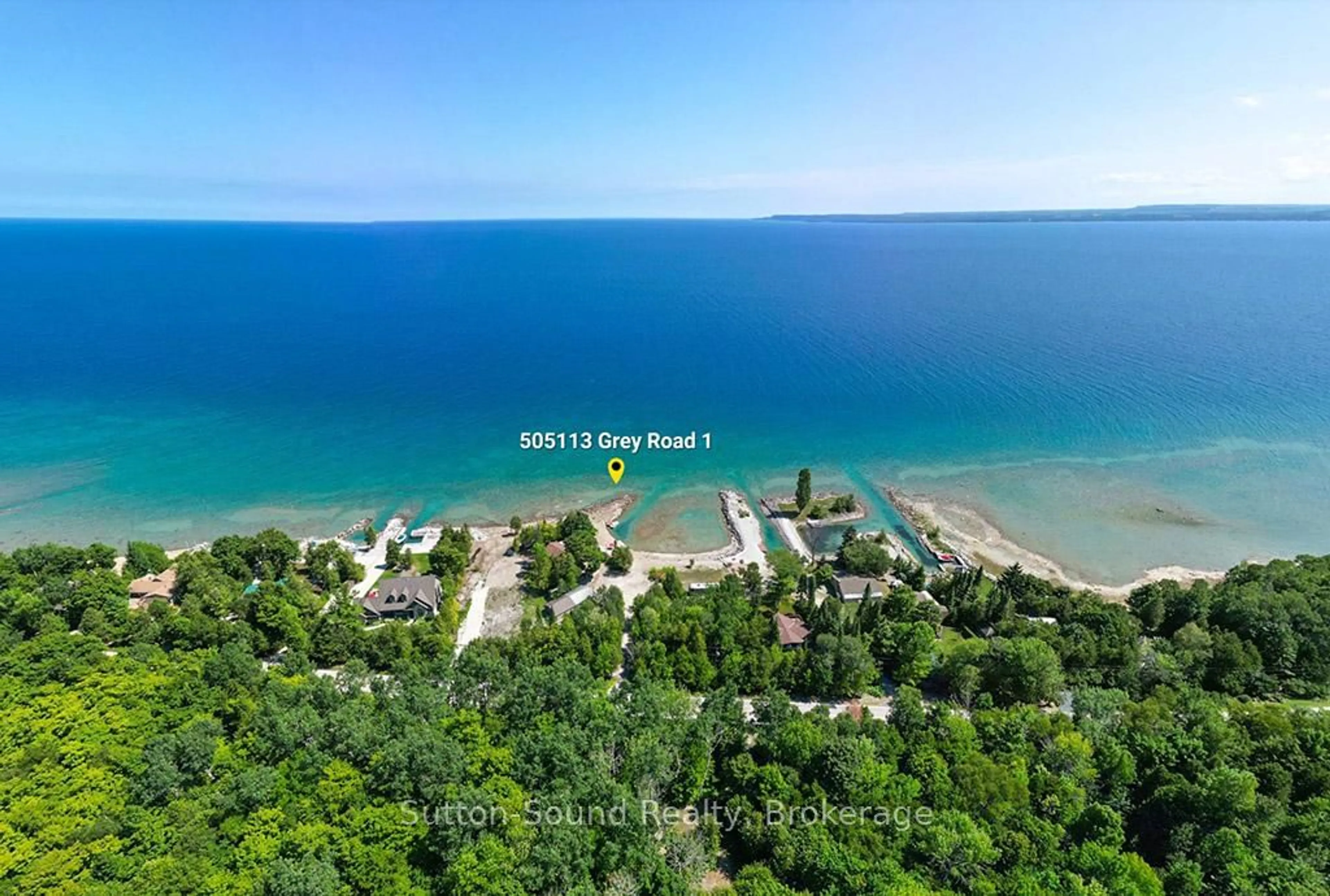 A pic from outside/outdoor area/front of a property/back of a property/a pic from drone, water/lake/river/ocean view for 505113 GREY ROAD 1, Georgian Bluffs Ontario N0H 2T0