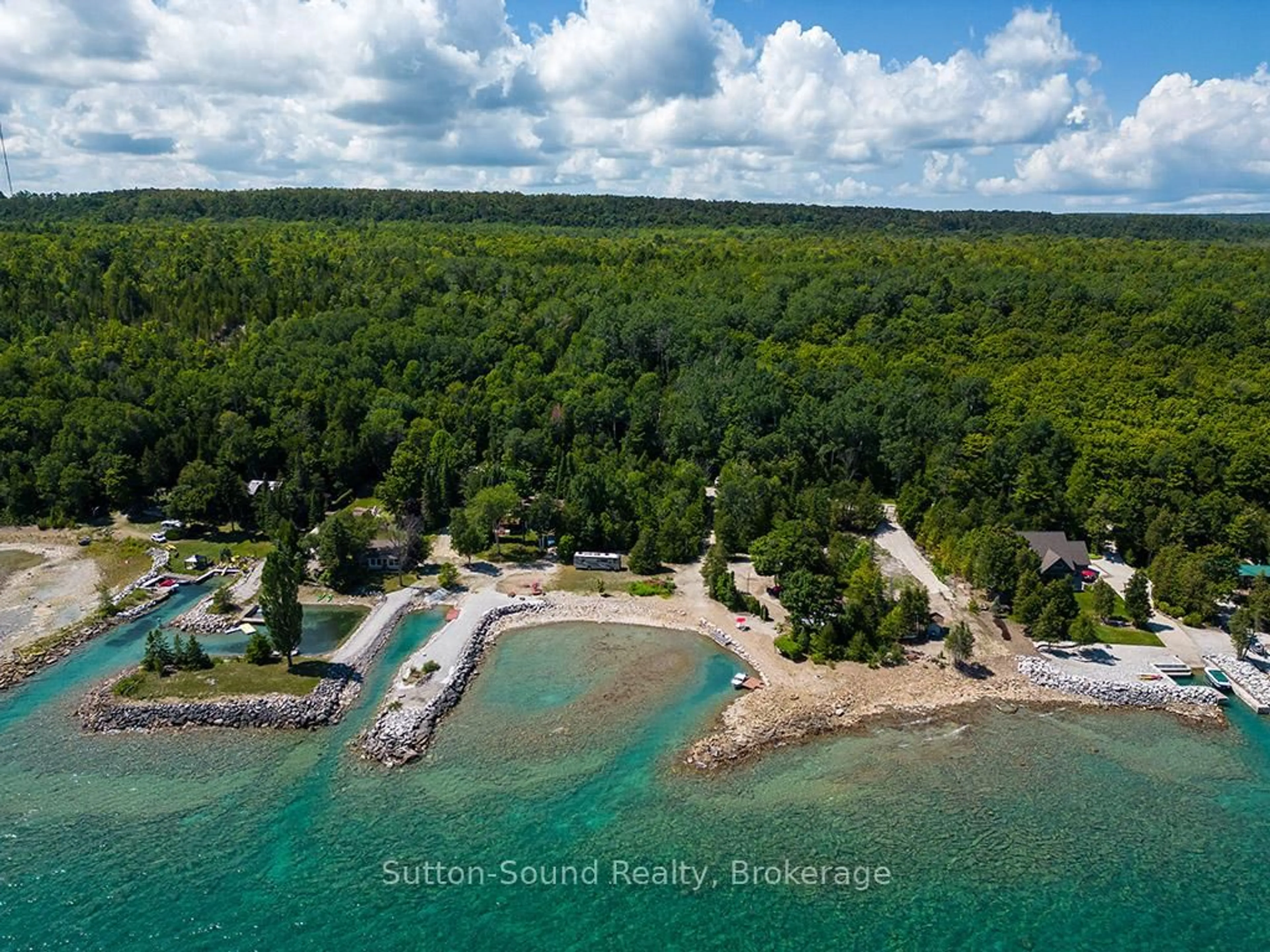 A pic from outside/outdoor area/front of a property/back of a property/a pic from drone, water/lake/river/ocean view for 505113 GREY ROAD 1, Georgian Bluffs Ontario N0H 2T0