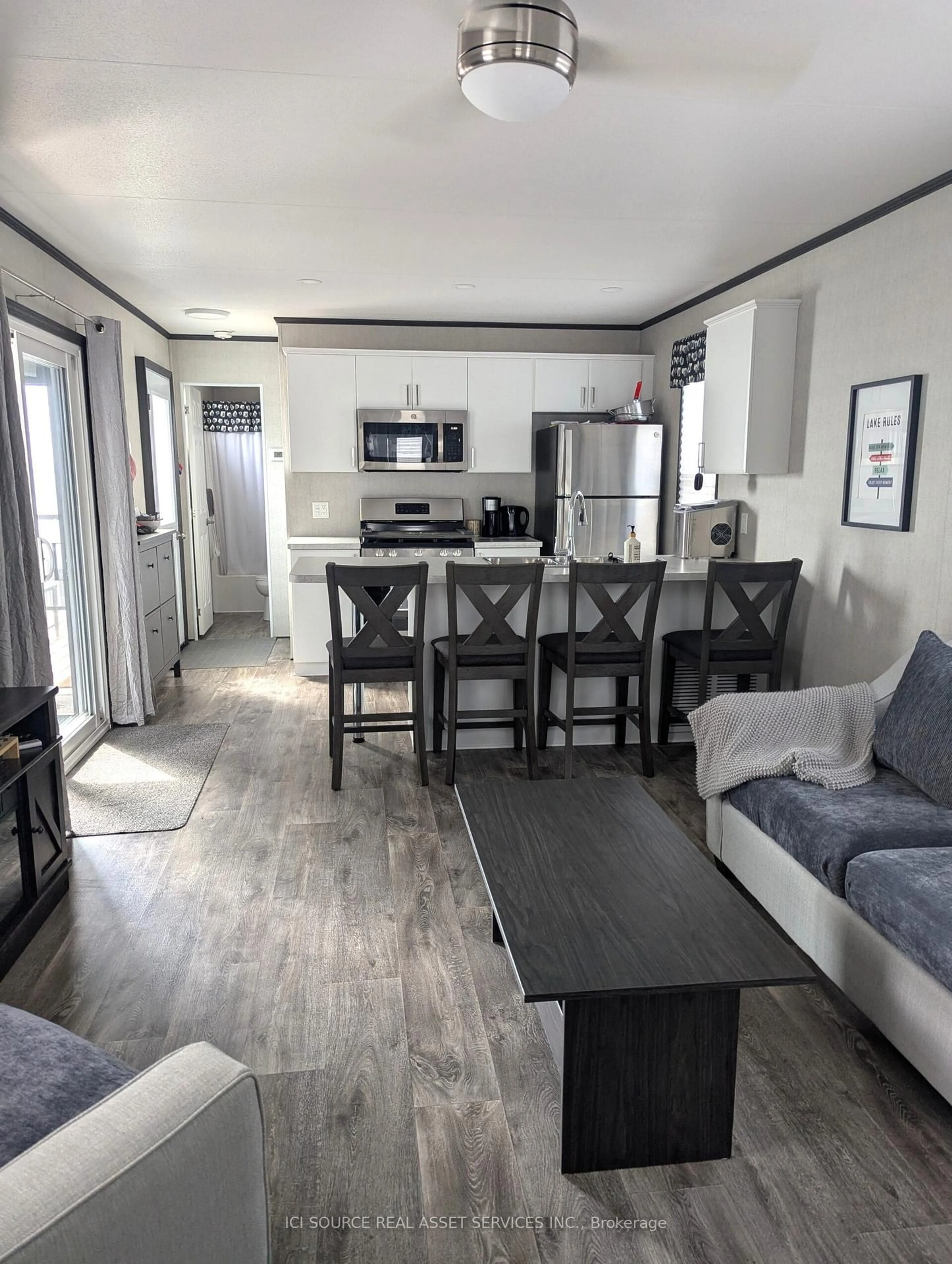 Open concept kitchen, wood/laminate floor for 7100 County Rd 18 #SBR41, Alnwick/Haldimand Ontario K0K 2X0