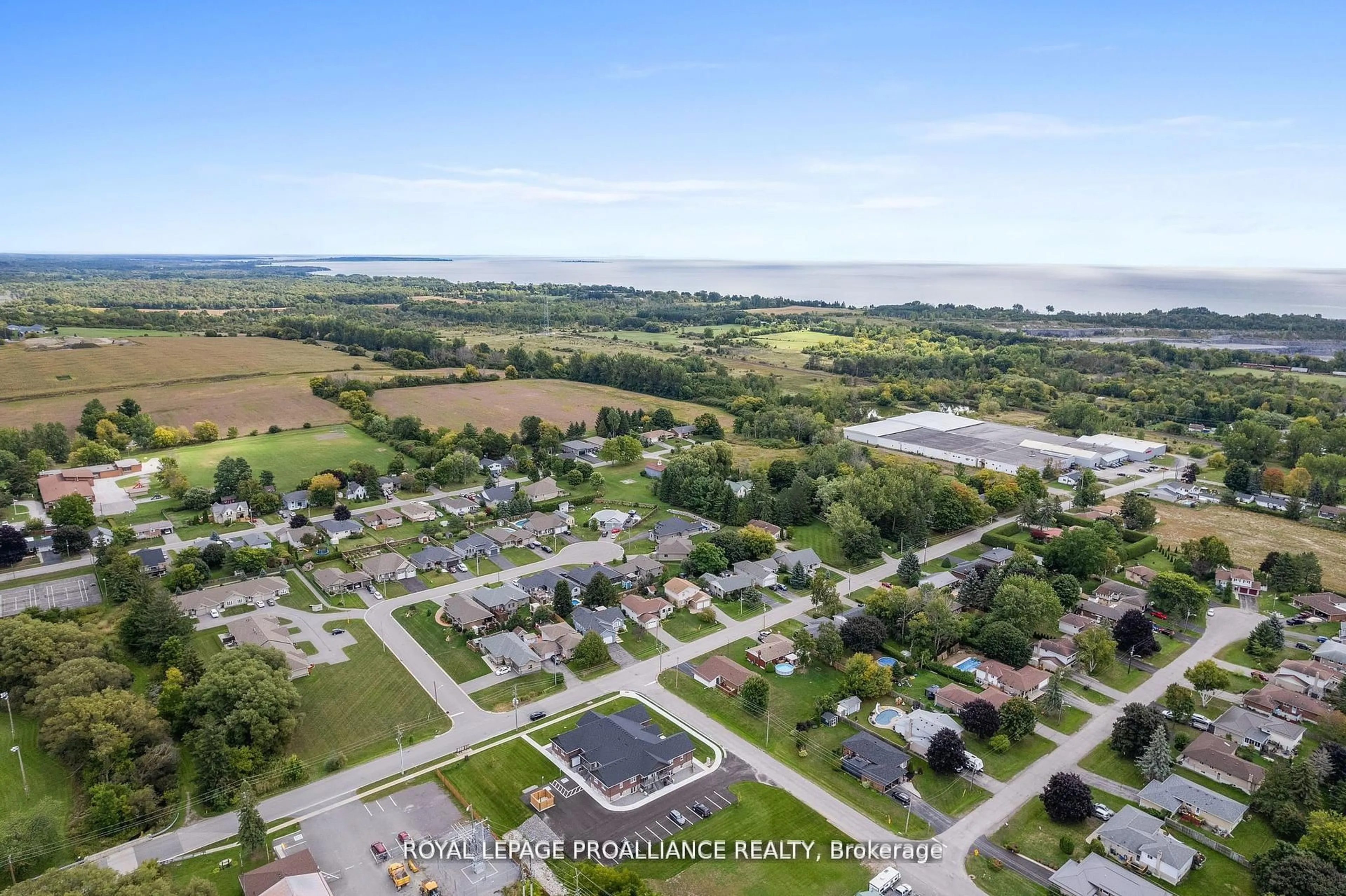 A pic from outside/outdoor area/front of a property/back of a property/a pic from drone, water/lake/river/ocean view for 15 Arthur St #106, Cramahe Ontario K0K 1S0