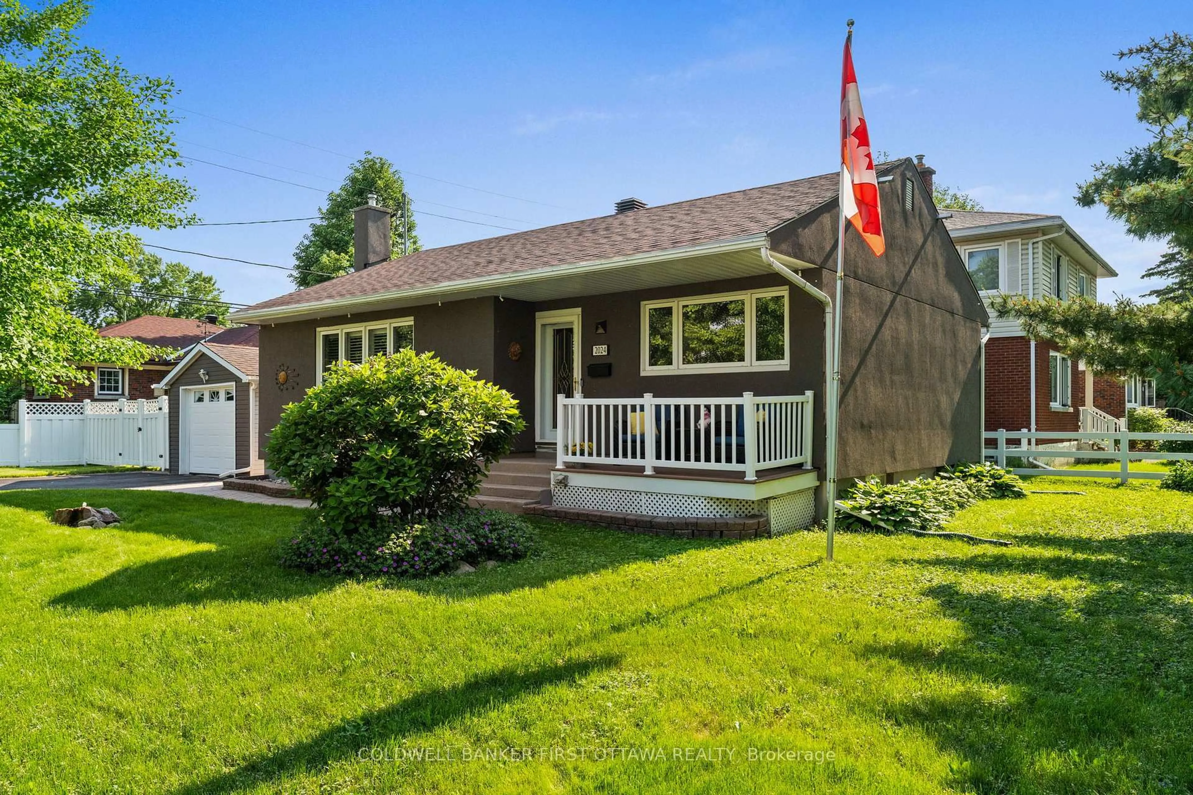 Home with vinyl exterior material, street for 2024 Corry St, Ottawa Ontario K1G 2M5