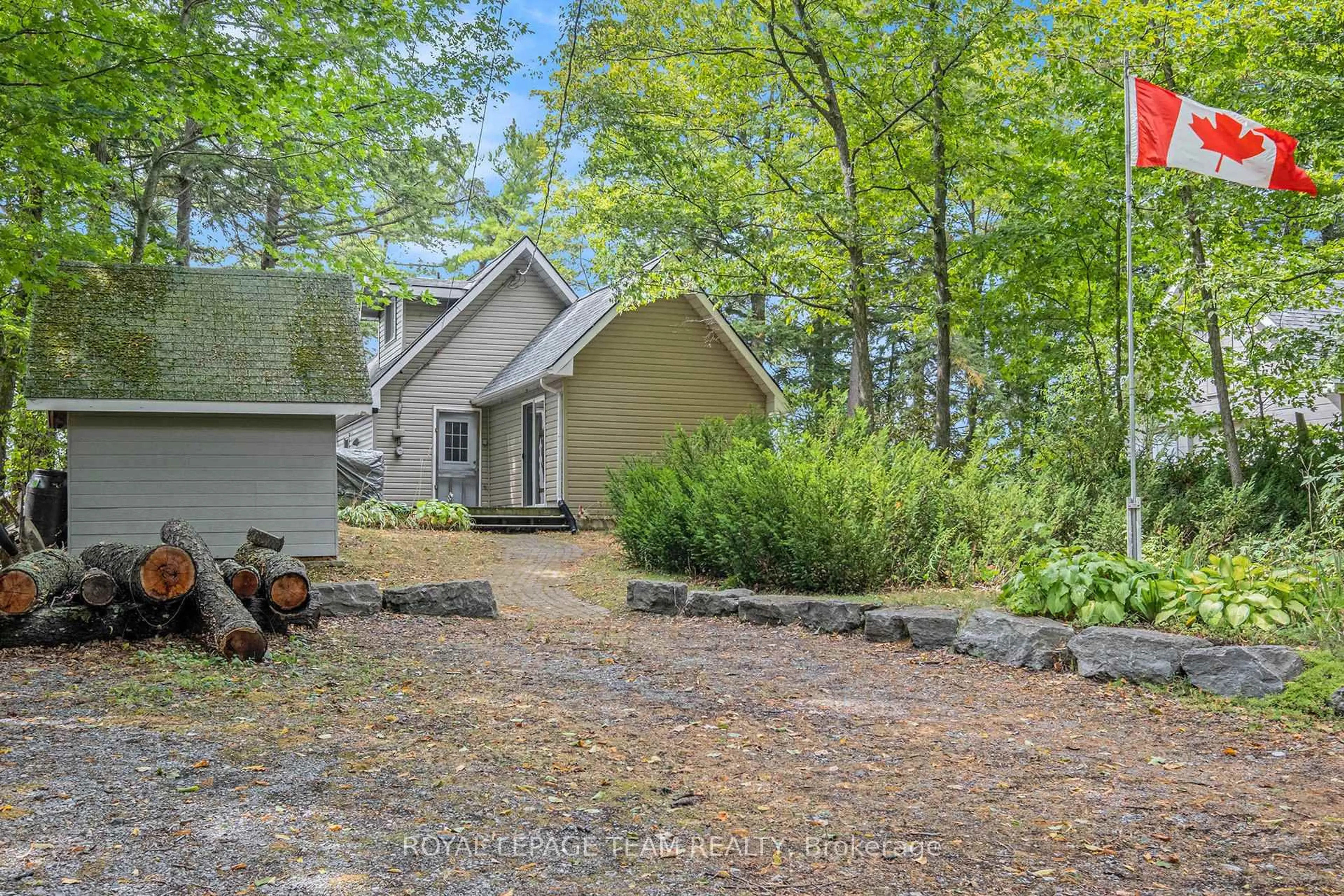 A pic from outside/outdoor area/front of a property/back of a property/a pic from drone, forest/trees view for 18 O9 Rd, Rideau Lakes Ontario K0G 1L0