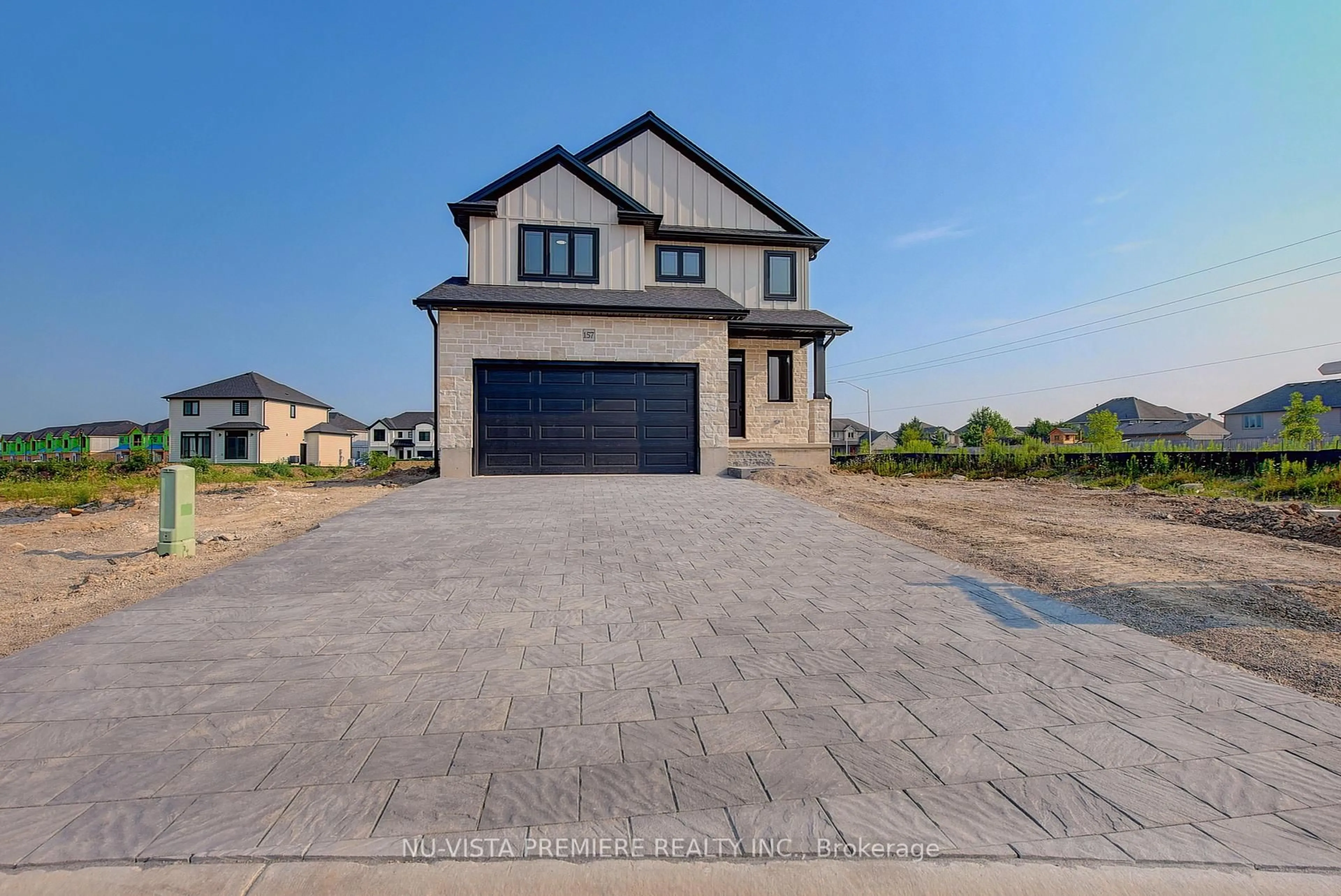 Home with brick exterior material, street for 157 Holloway Tr, Middlesex Centre Ontario N0M 2A0