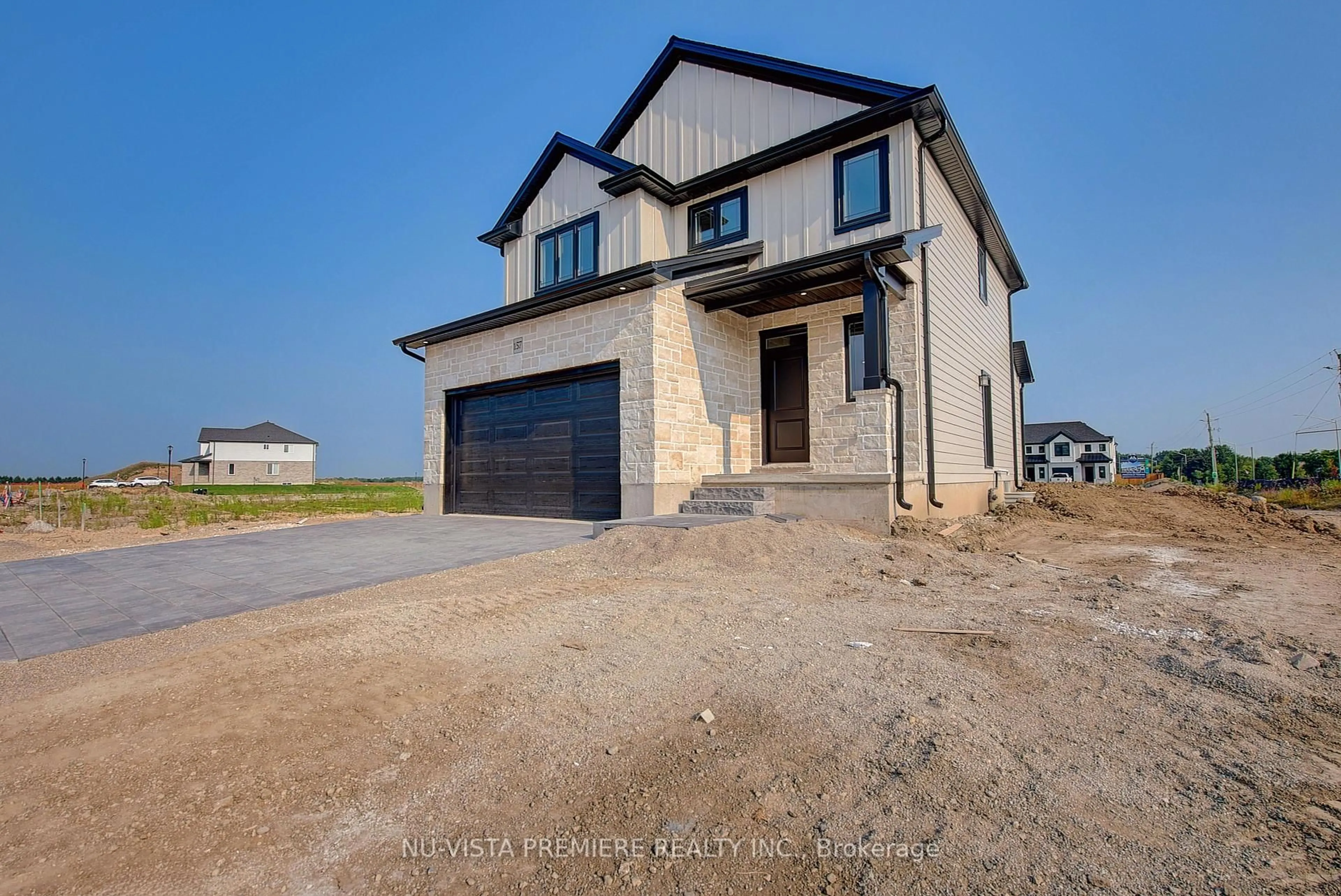 Home with brick exterior material, street for 157 Holloway Tr, Middlesex Centre Ontario N0M 2A0