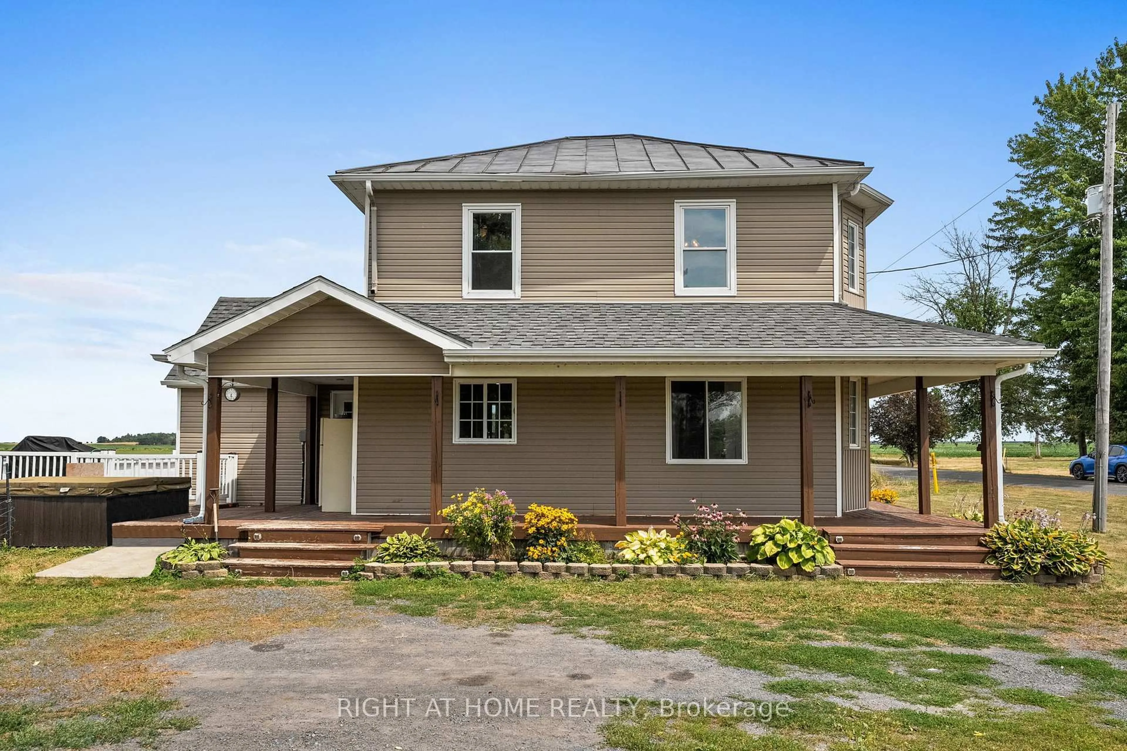 Home with vinyl exterior material, street for 15365 ASHBURN Rd, North Stormont Ontario K0C 1G0