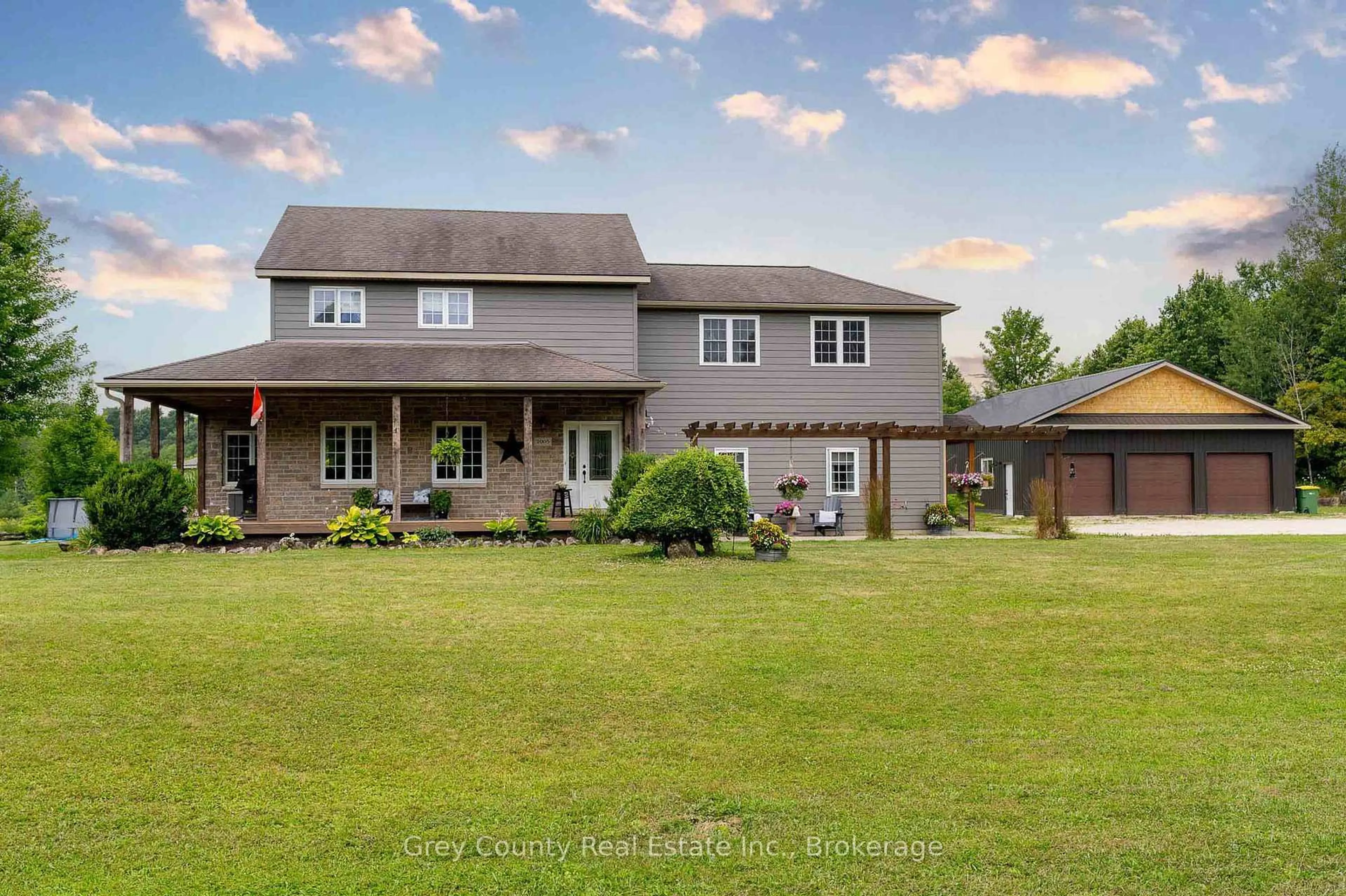 A pic from outside/outdoor area/front of a property/back of a property/a pic from drone, water/lake/river/ocean view for 135260 9th Line, Grey Highlands Ontario N0C 1H0