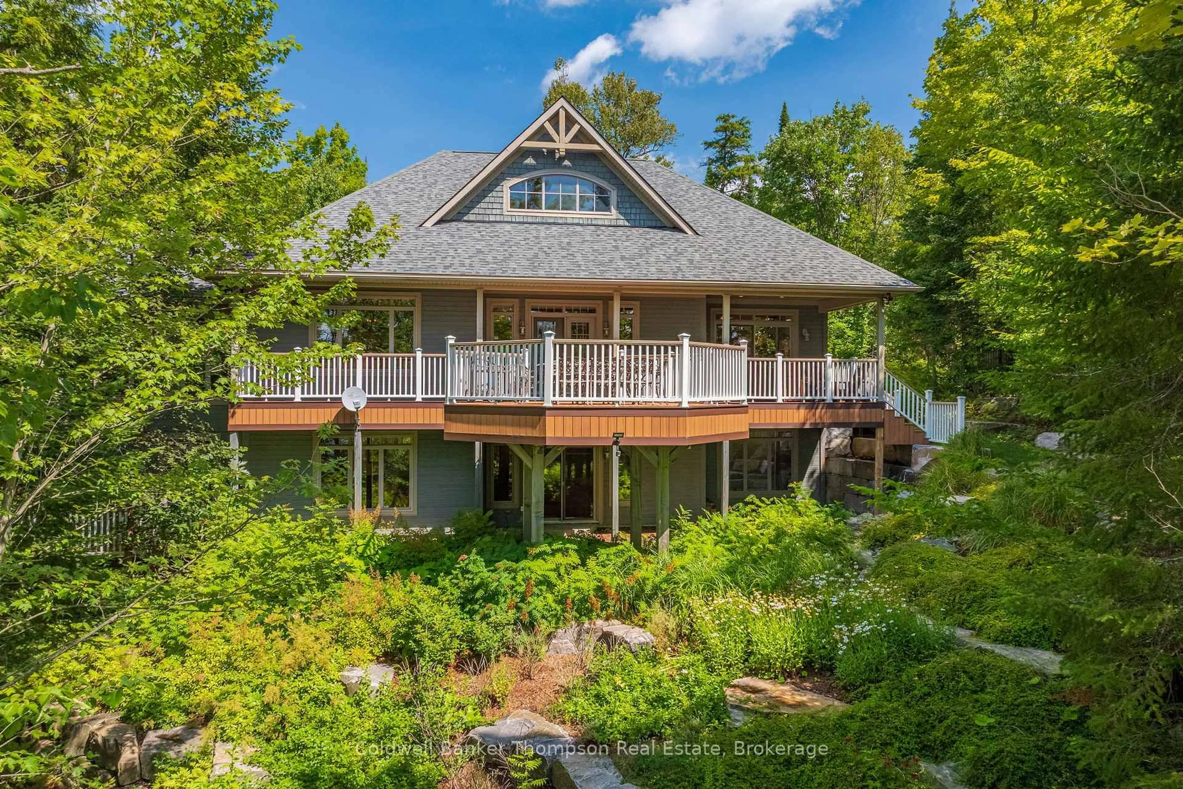 A pic from outside/outdoor area/front of a property/back of a property/a pic from drone, water/lake/river/ocean view for 2202 60 Highway, Lake of Bays Ontario P1H 2J6
