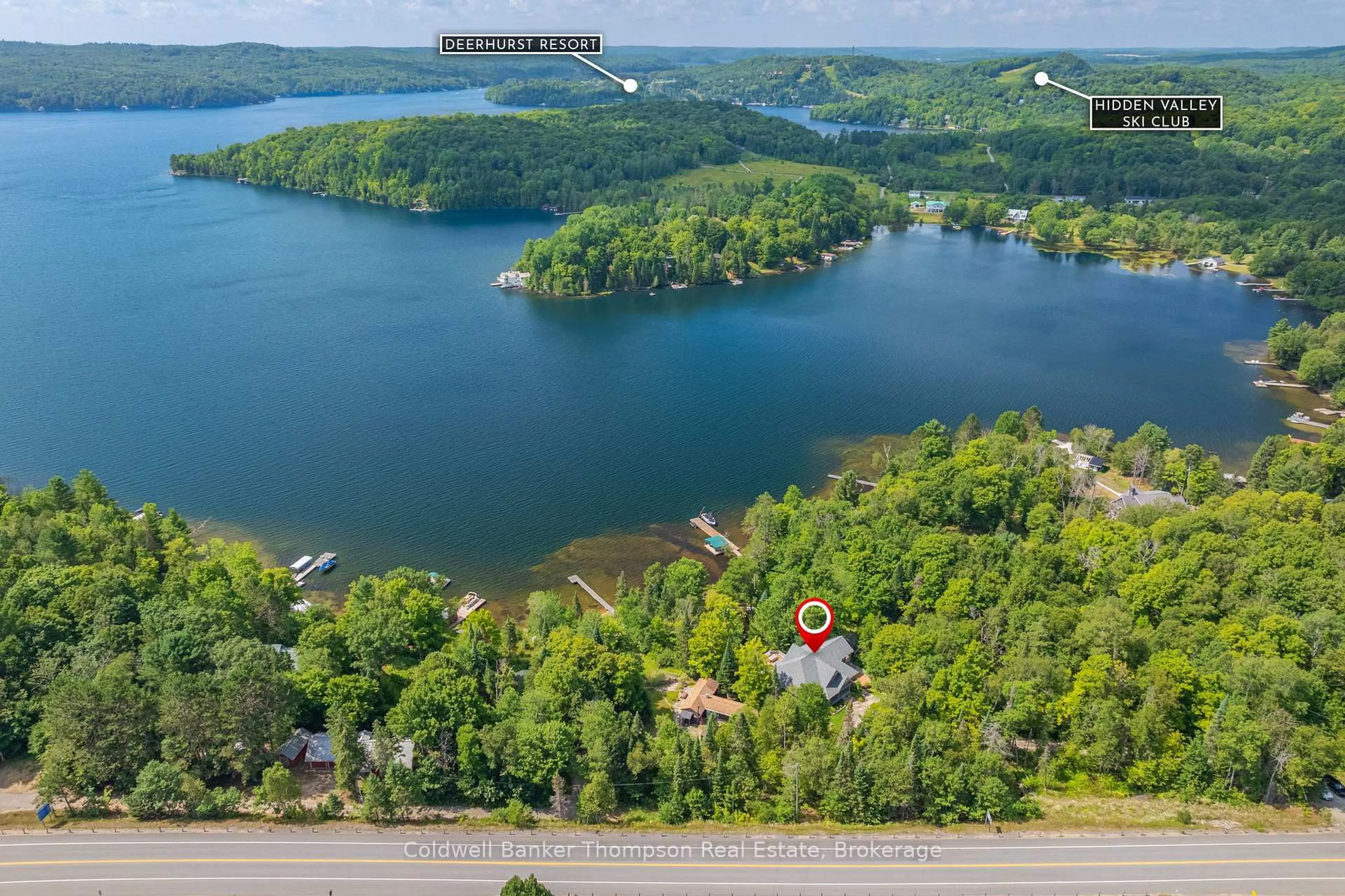 A pic from outside/outdoor area/front of a property/back of a property/a pic from drone, water/lake/river/ocean view for 2202 60 Highway, Lake of Bays Ontario P1H 2J6