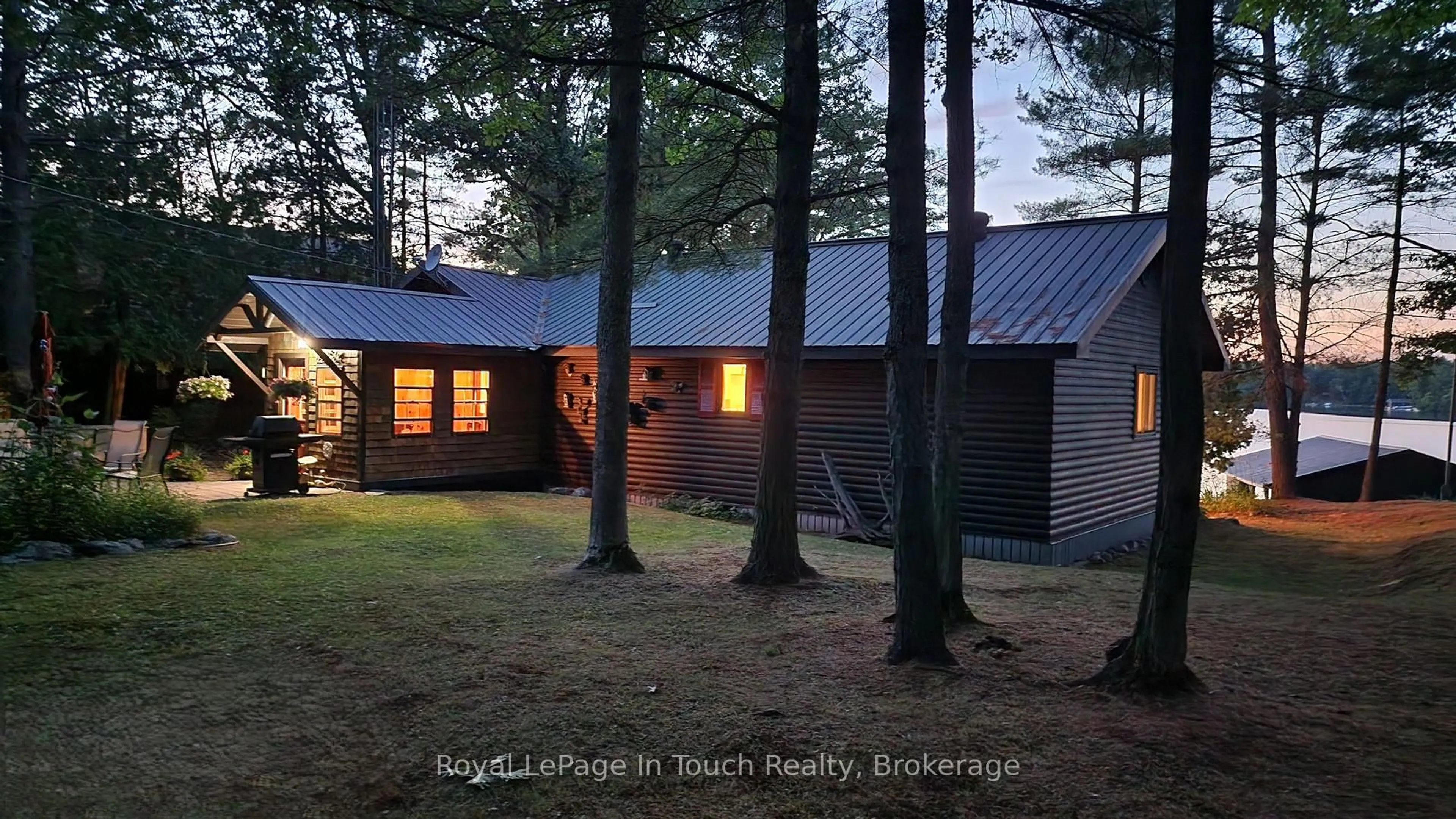 A pic from outside/outdoor area/front of a property/back of a property/a pic from drone, unknown for 211 Pickerel Point Rd, Georgian Bay Ontario L0K 1S0