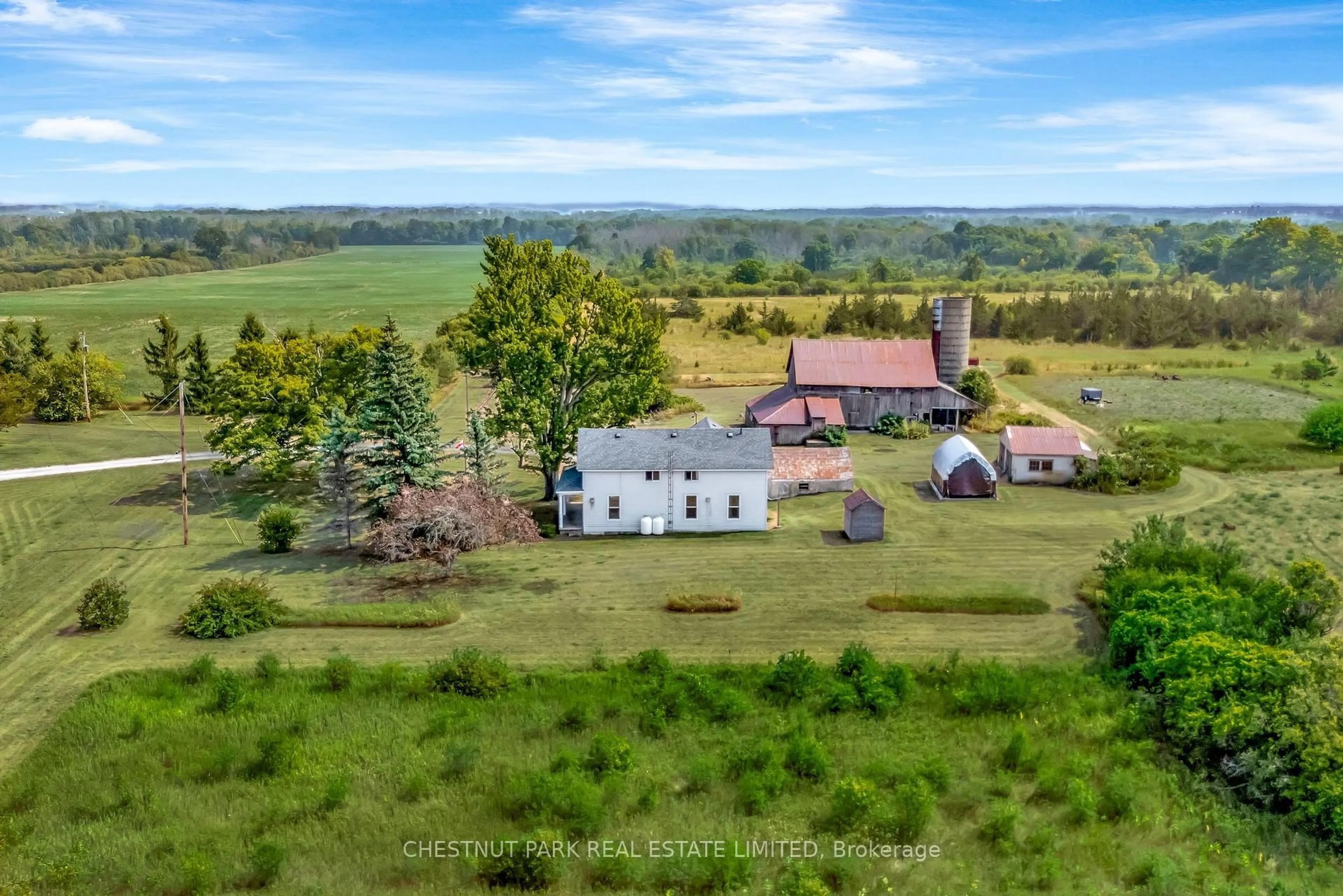 A pic from outside/outdoor area/front of a property/back of a property/a pic from drone, mountain view for 403 Closson Rd, Prince Edward County Ontario K0K 2J0