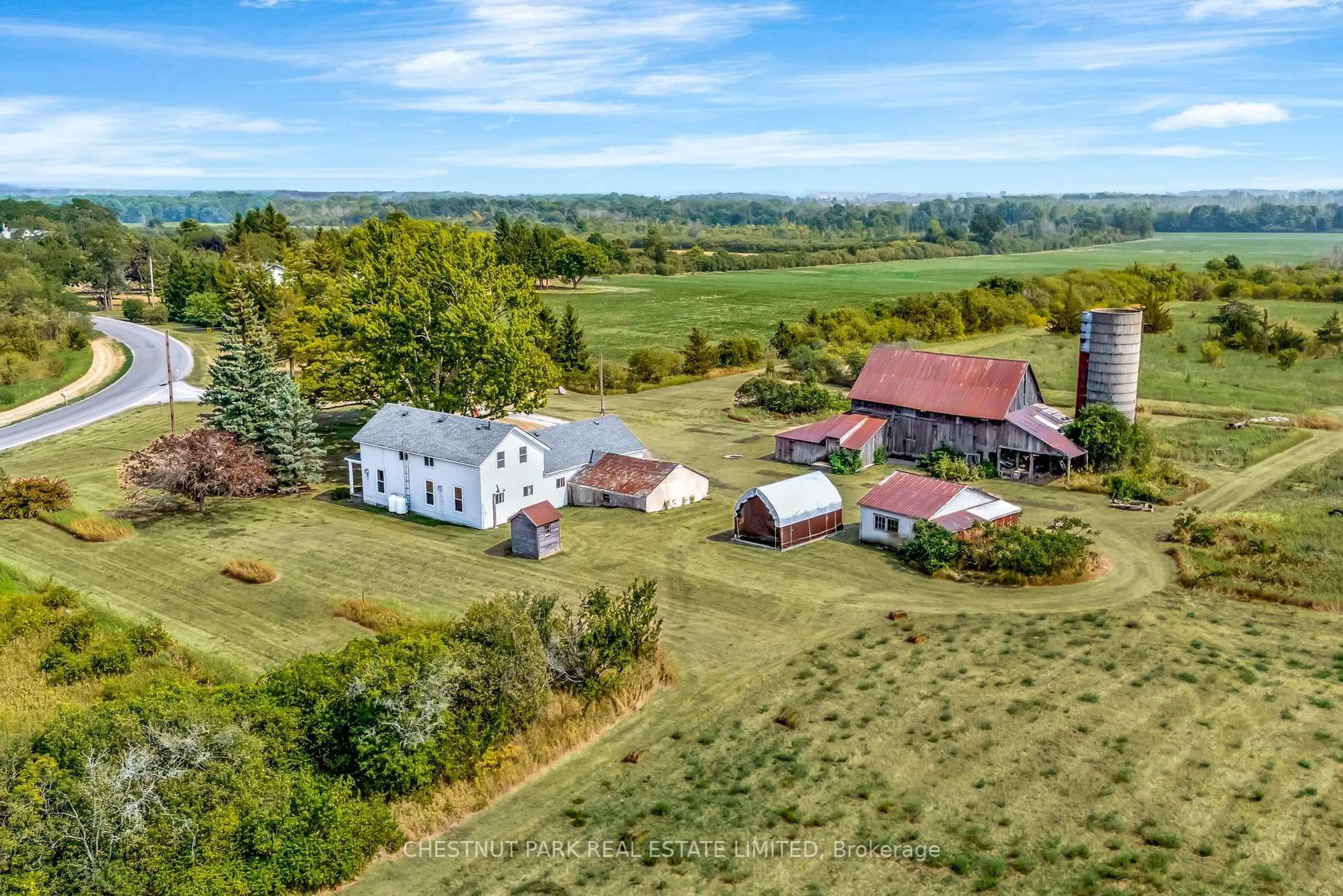 A pic from outside/outdoor area/front of a property/back of a property/a pic from drone, mountain view for 403 Closson Rd, Prince Edward County Ontario K0K 2J0