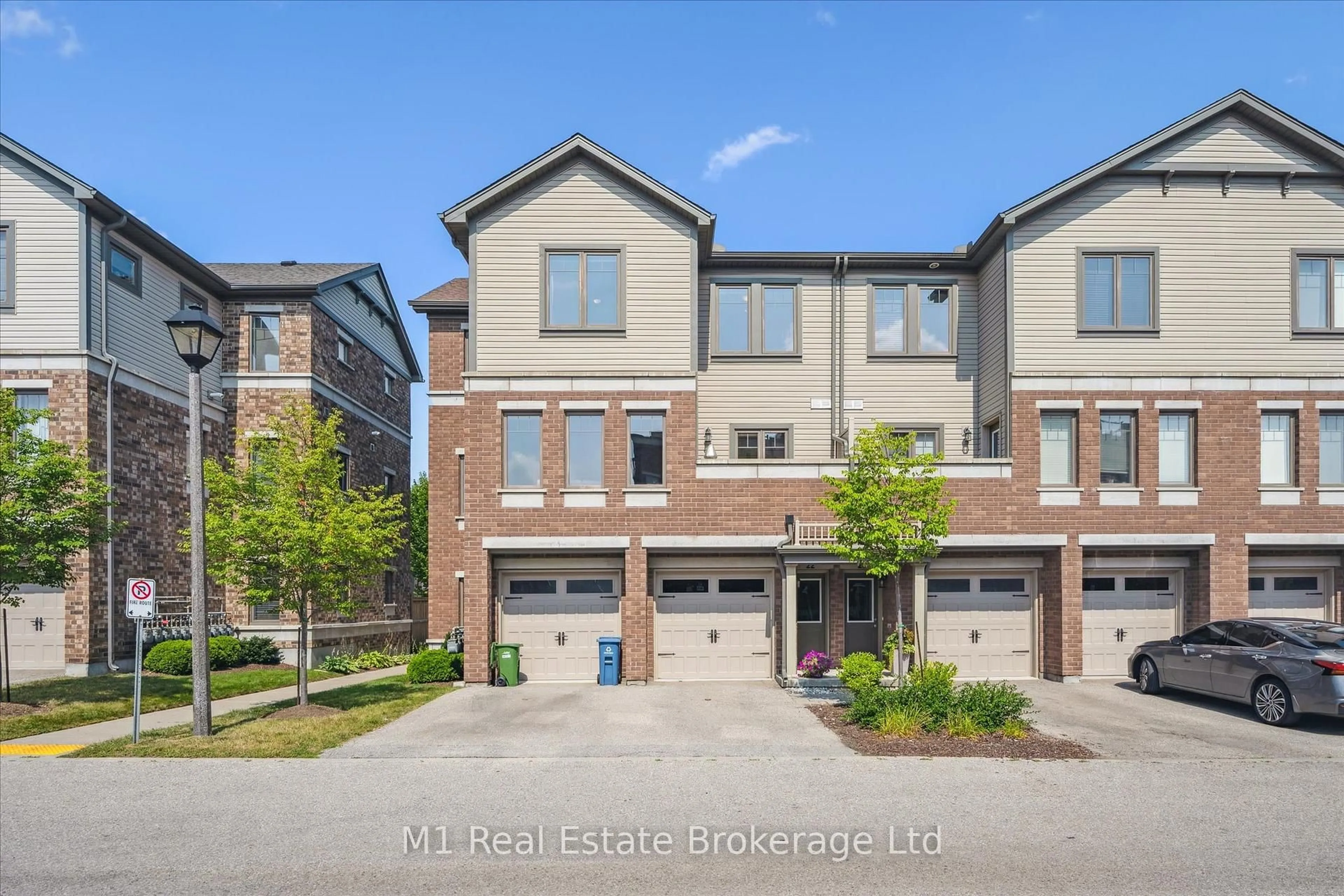 A pic from outside/outdoor area/front of a property/back of a property/a pic from drone, street for 39 Kay Cres #22, Guelph Ontario N1L 0N5