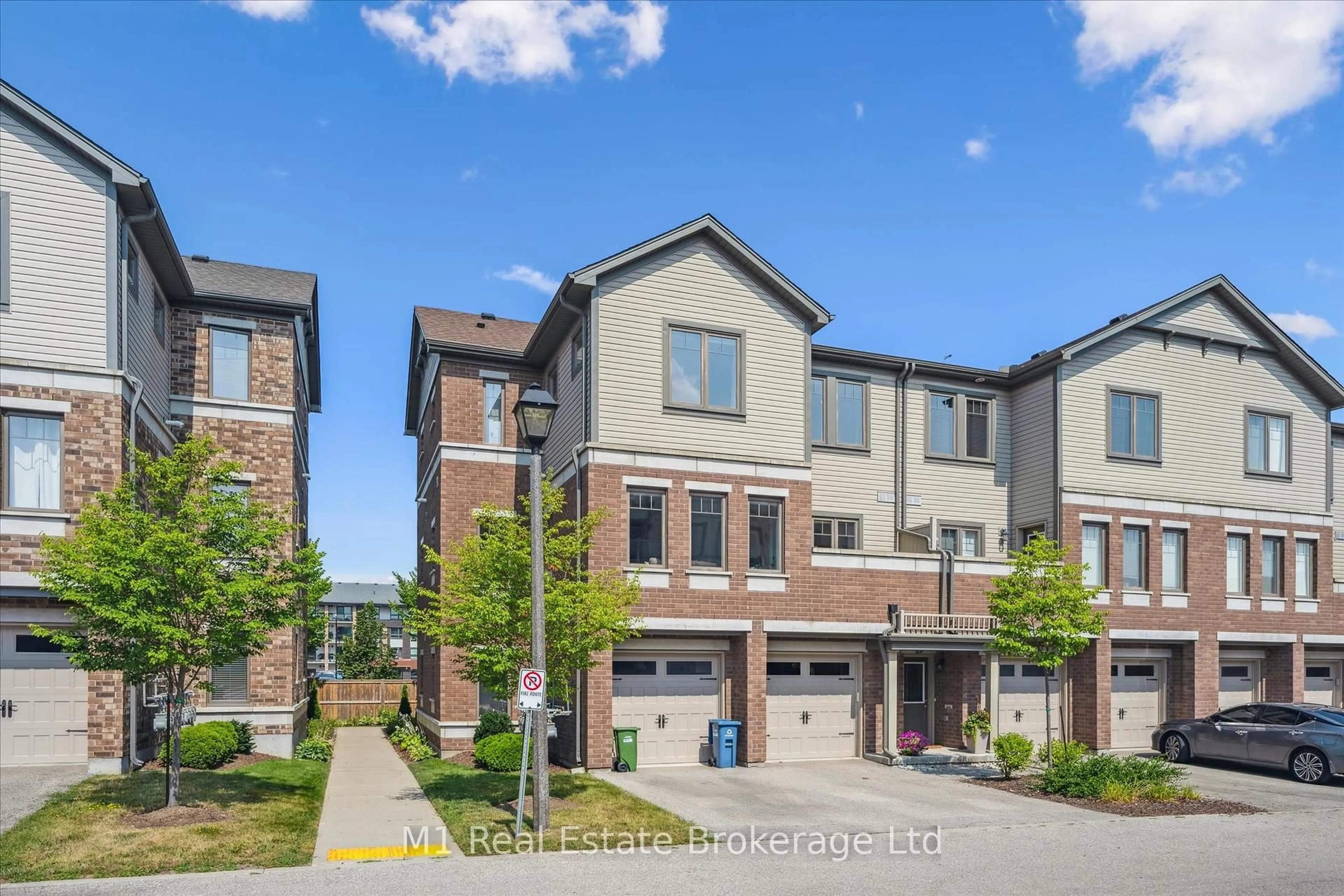 Home with brick exterior material, street for 39 Kay Cres #22, Guelph Ontario N1L 0N5