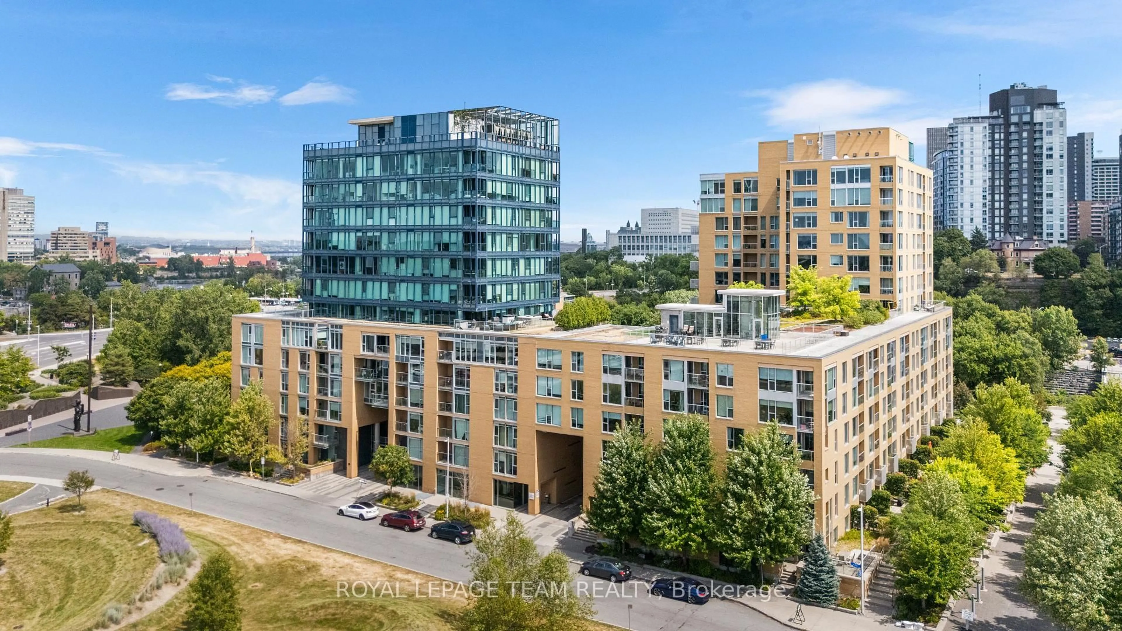 A pic from outside/outdoor area/front of a property/back of a property/a pic from drone, city buildings view from balcony for 250 Lett St #107, Ottawa Ontario K1R 0A8