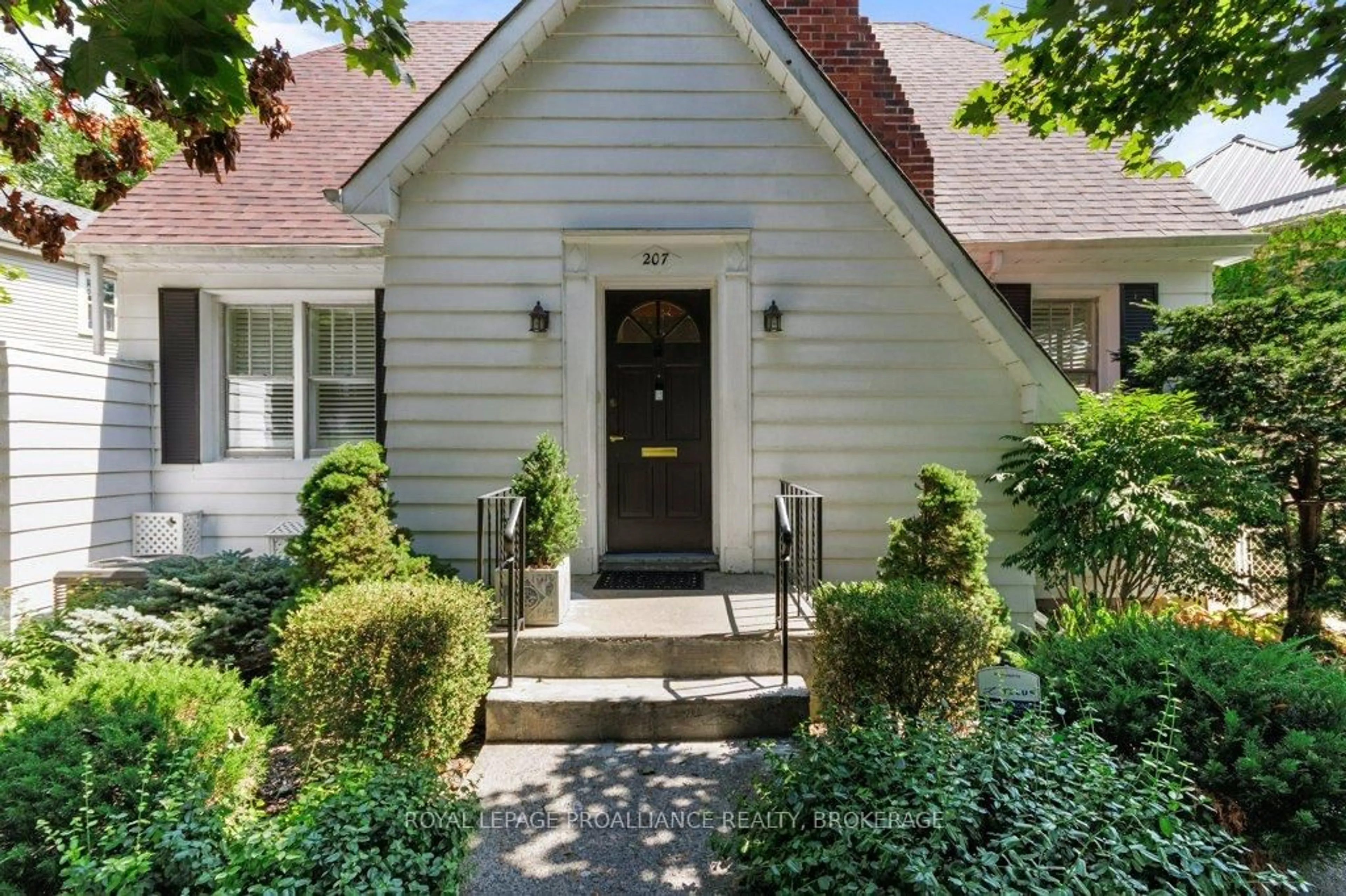 Home with brick exterior material, street for 207 College St, Kingston Ontario K7L 4L9