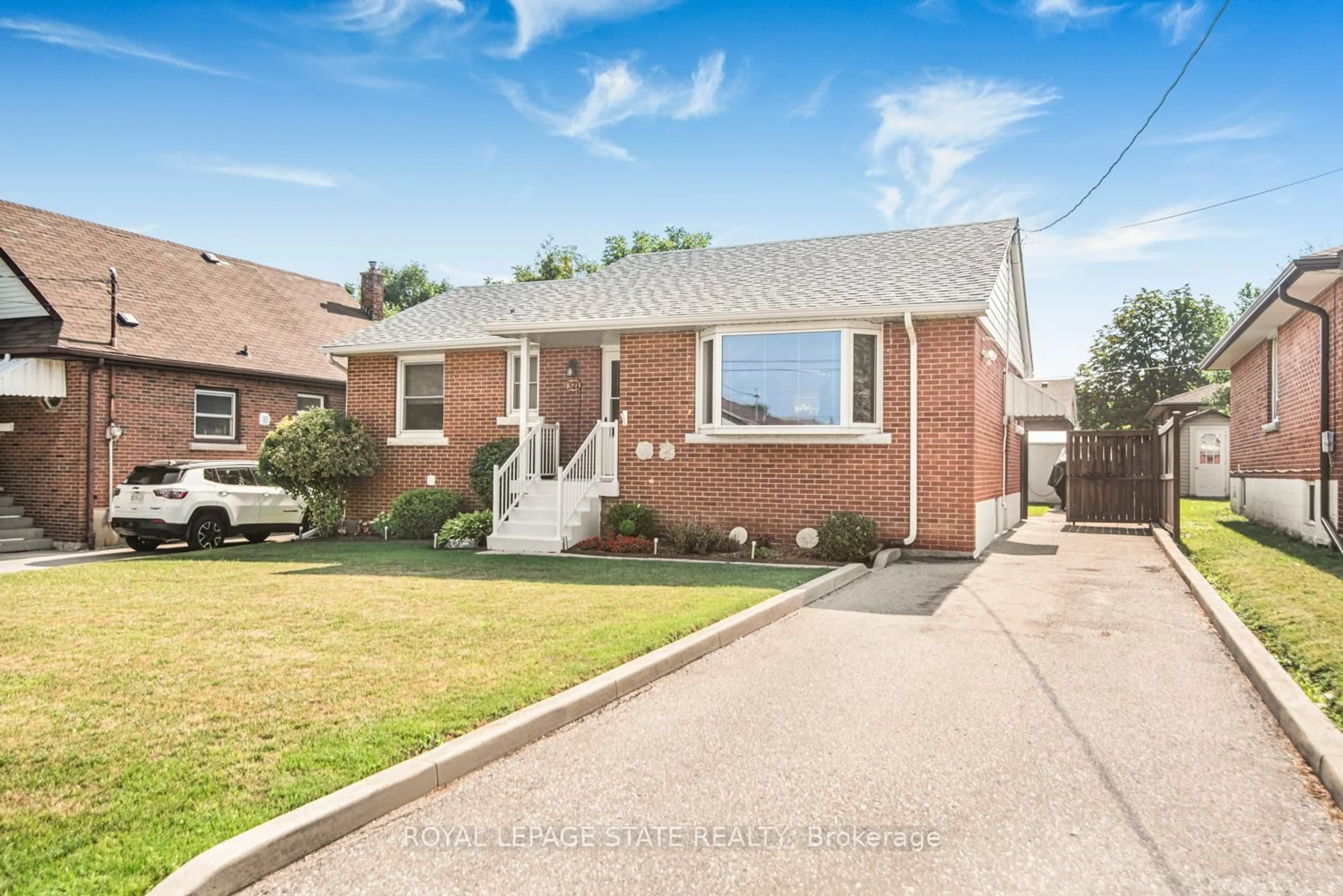 Home with brick exterior material, street for 321 East 15th St, Hamilton Ontario L9A 4G6