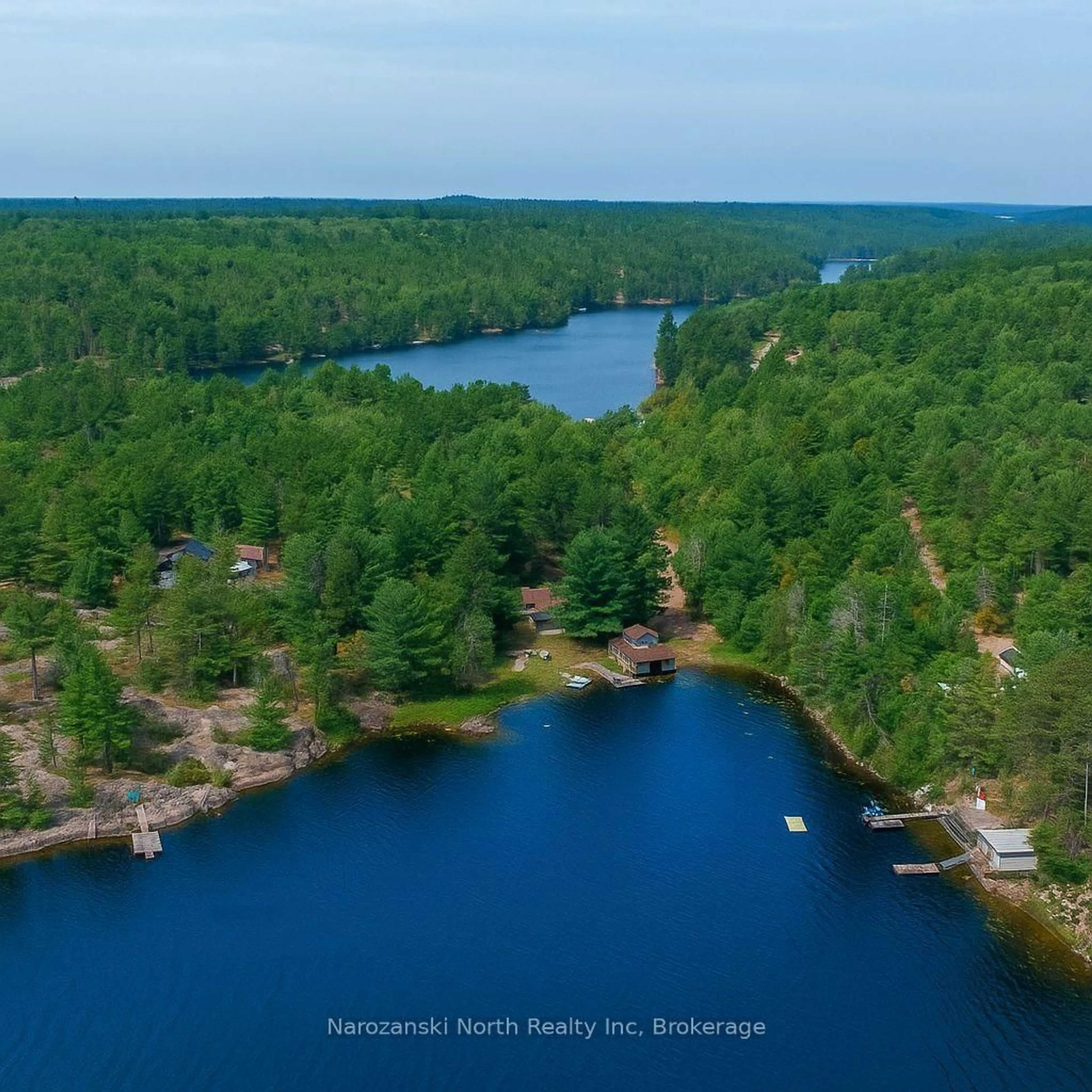 A pic from outside/outdoor area/front of a property/back of a property/a pic from drone, water/lake/river/ocean view for 118A Plouffe Rd, French River Ontario P0M 2N0