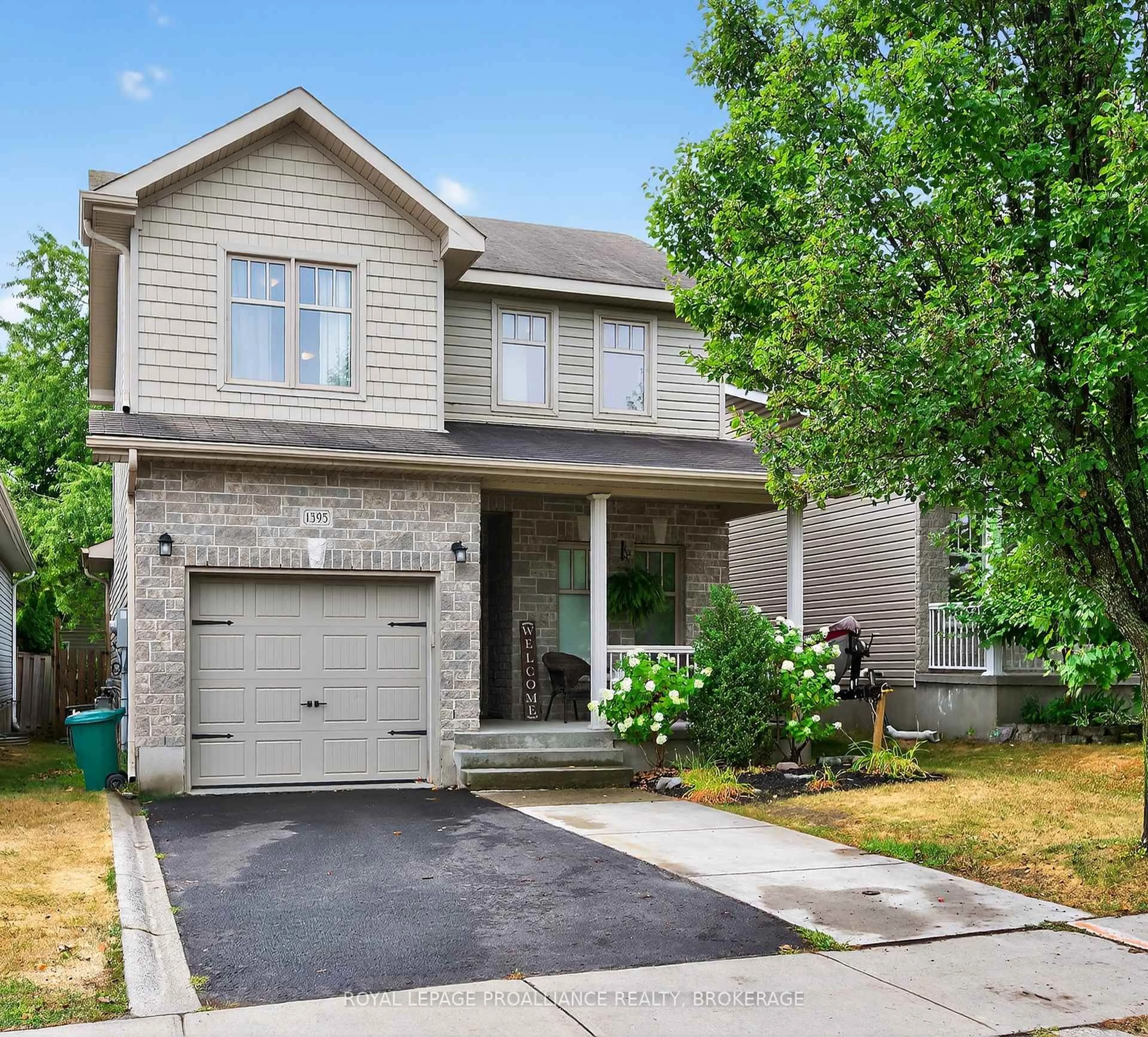 Home with vinyl exterior material, street for 1395 Atkinson St, Kingston Ontario K7P 0C4