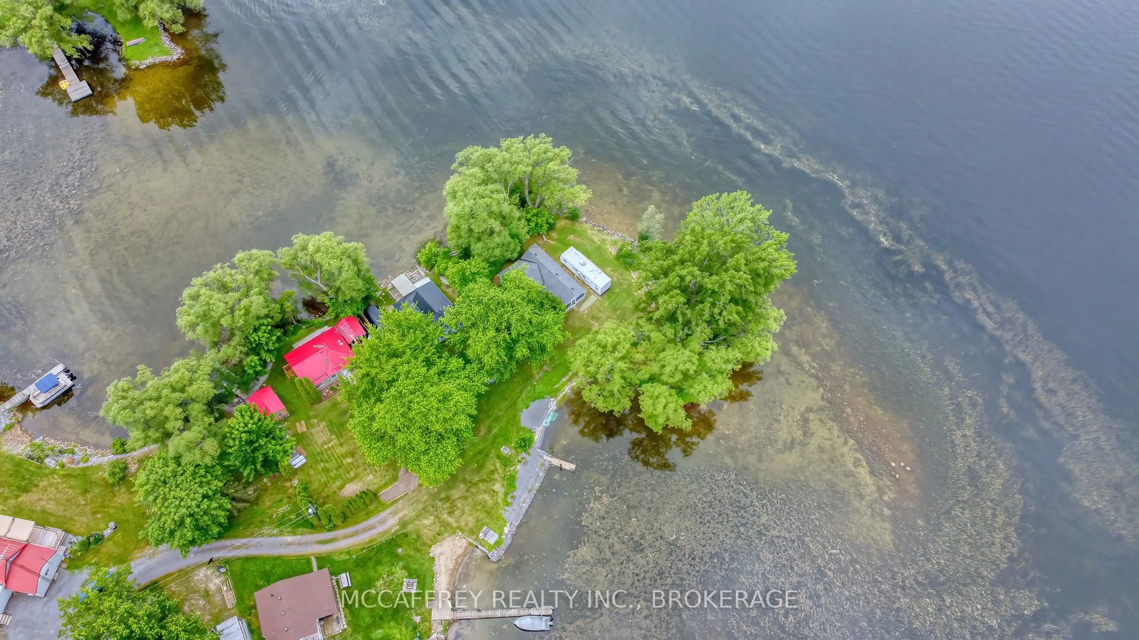 A pic from outside/outdoor area/front of a property/back of a property/a pic from drone, water/lake/river/ocean view for 94 WILLOW POINT Lane, Napanee Ontario K7R 3K7