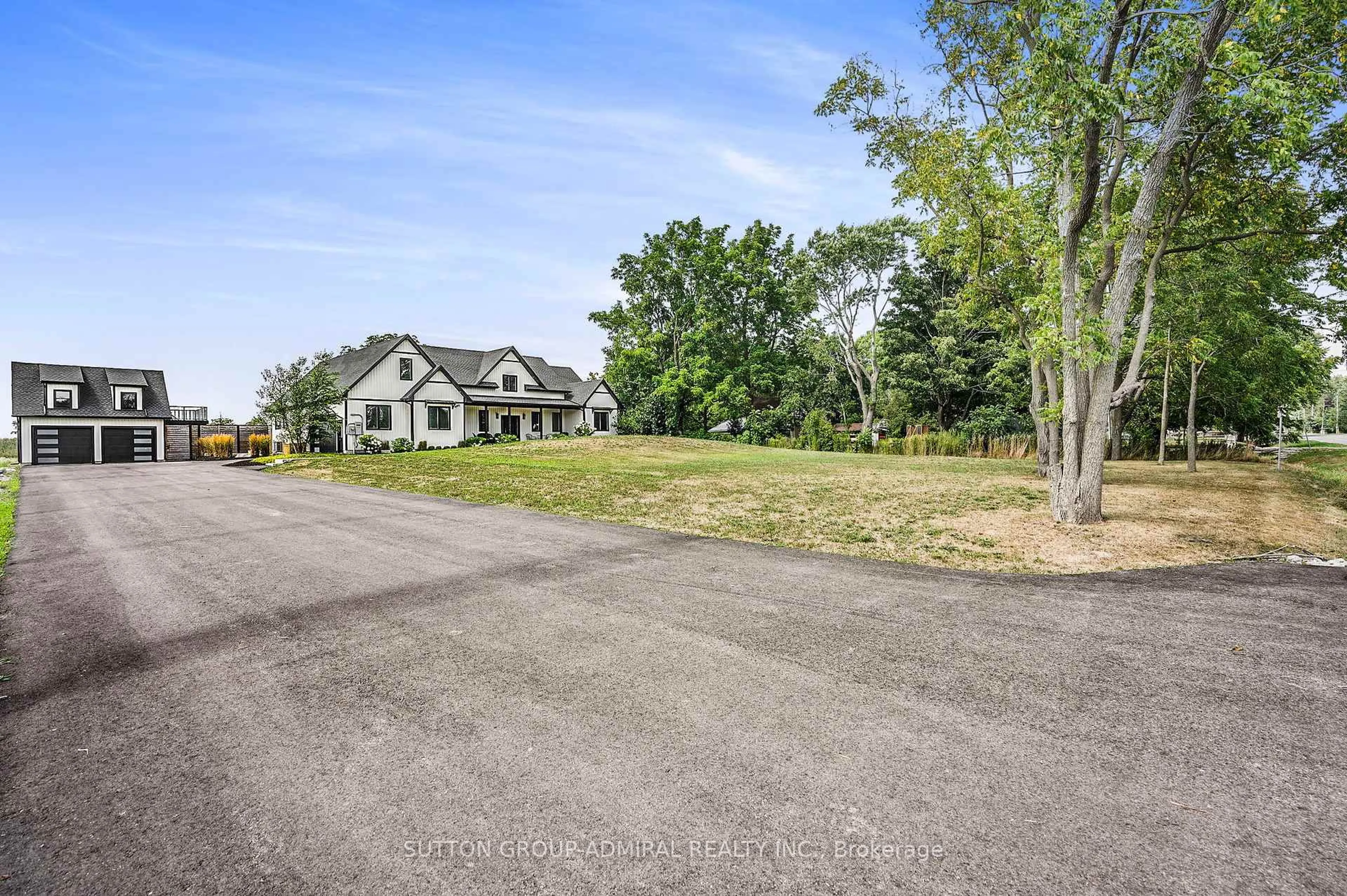 A pic from outside/outdoor area/front of a property/back of a property/a pic from drone, street for 480 Pleasant Beach Rd, Port Colborne Ontario L0S 1R0