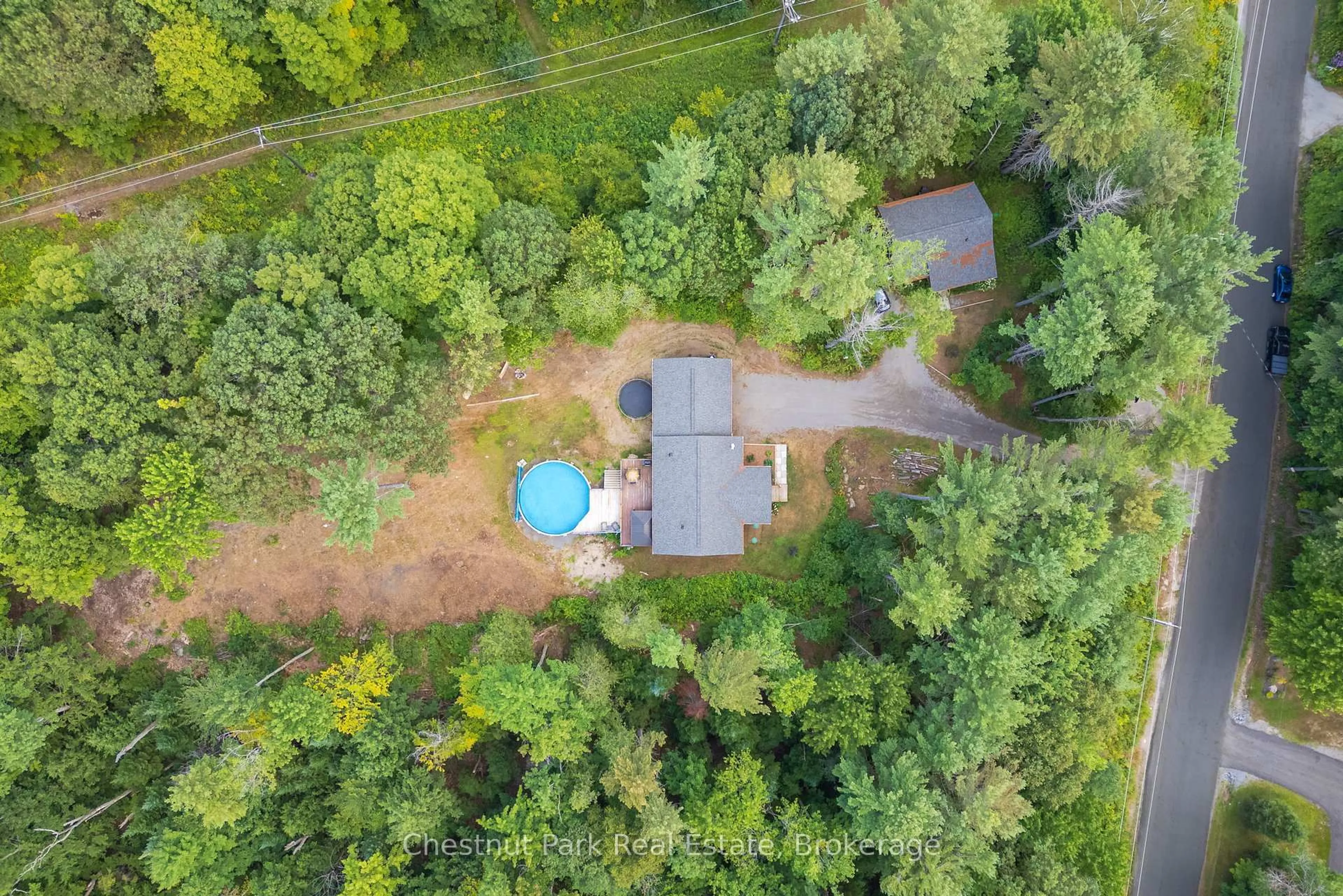 A pic from outside/outdoor area/front of a property/back of a property/a pic from drone, forest/trees view for 2698 Old Muskoka Rd, Huntsville Ontario P0B 1M0